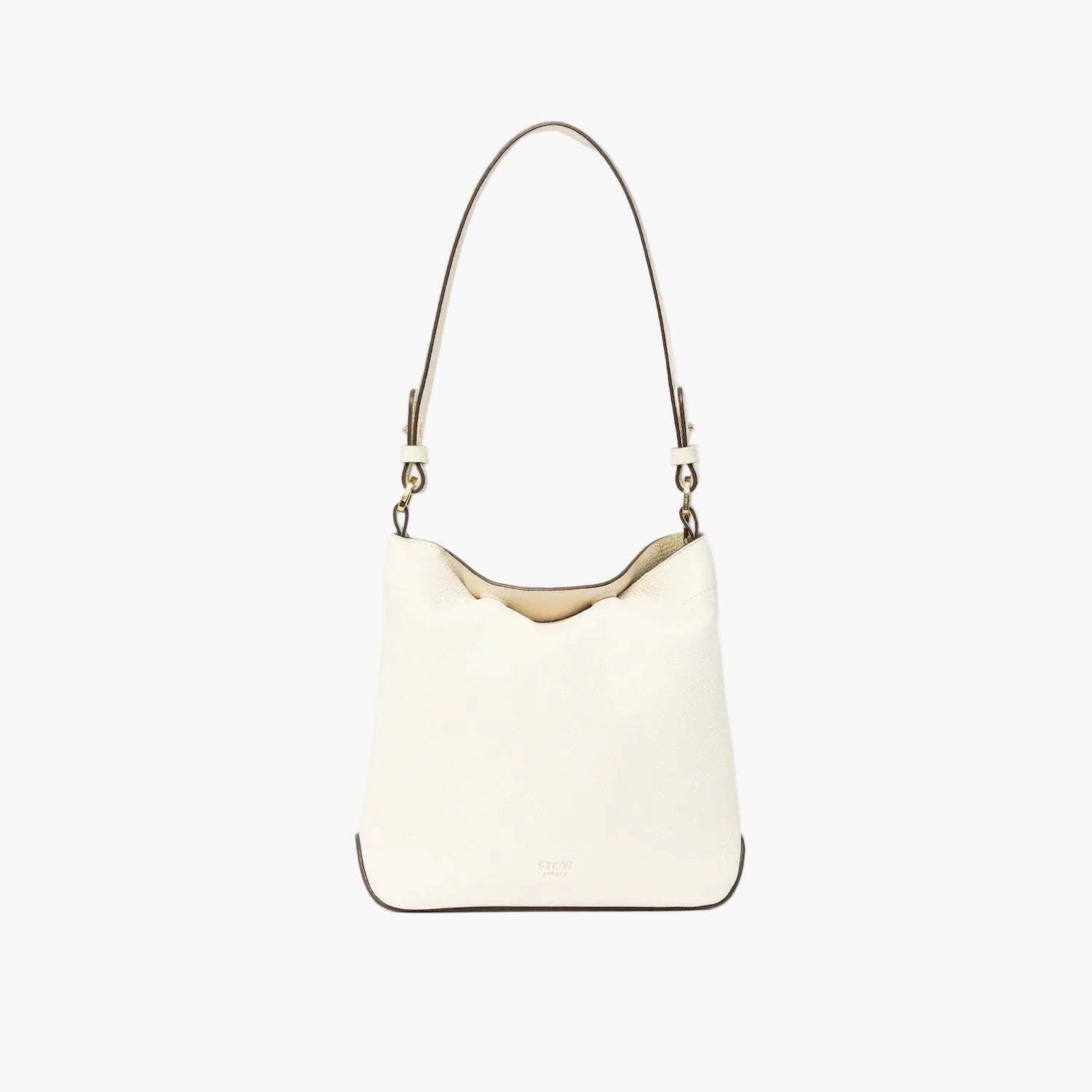 STOW London's Midi Curve in Spring Moon leather on a light grey background featuring the detachable shoulder strap with gold hardware and details