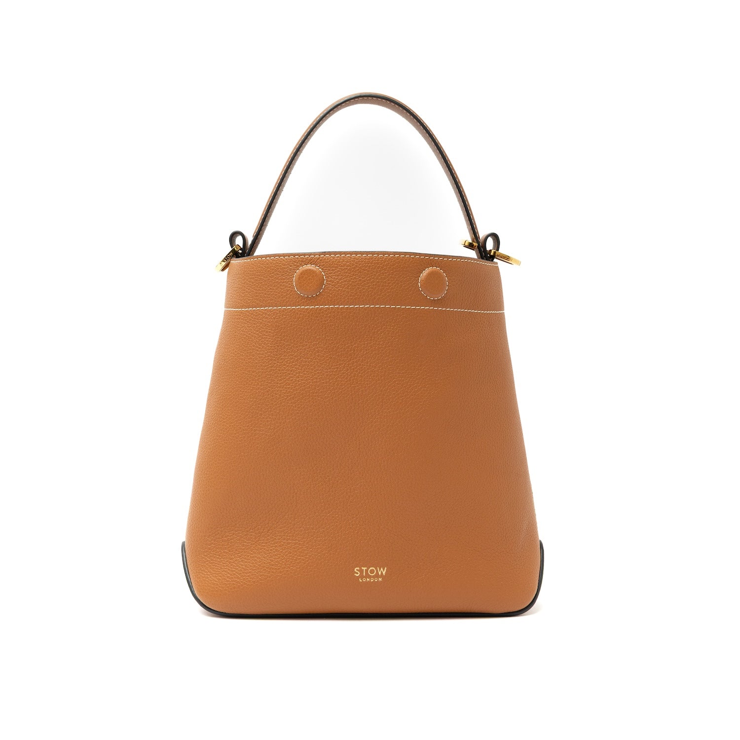 STOW London's Midi Curve bag in Earth Tan pebbled and smooth leather styled as a bucket bag featuring gold-coated stainless steel hardware on a white background