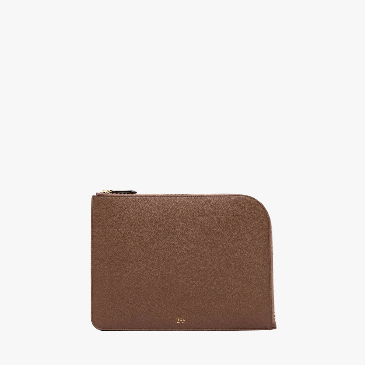 STOW London's Midi Leather Sleeve in Mocha pebbled leather on a light grey background featuring a YKK Natulon Zip and a fine gold embossed logo on the front bottom.