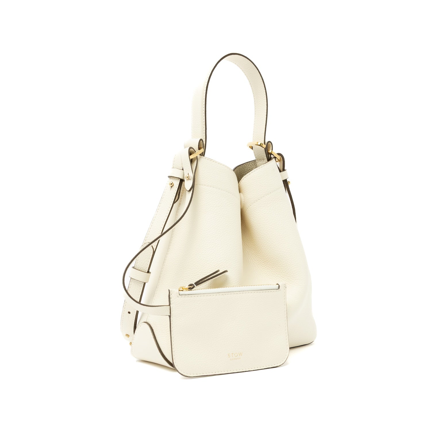 STOW London's Midi Curve bag and matching, detachable pouch in Spring Moon pebbled and smooth leather featuring gold-coated stainless steel hardware on a white background