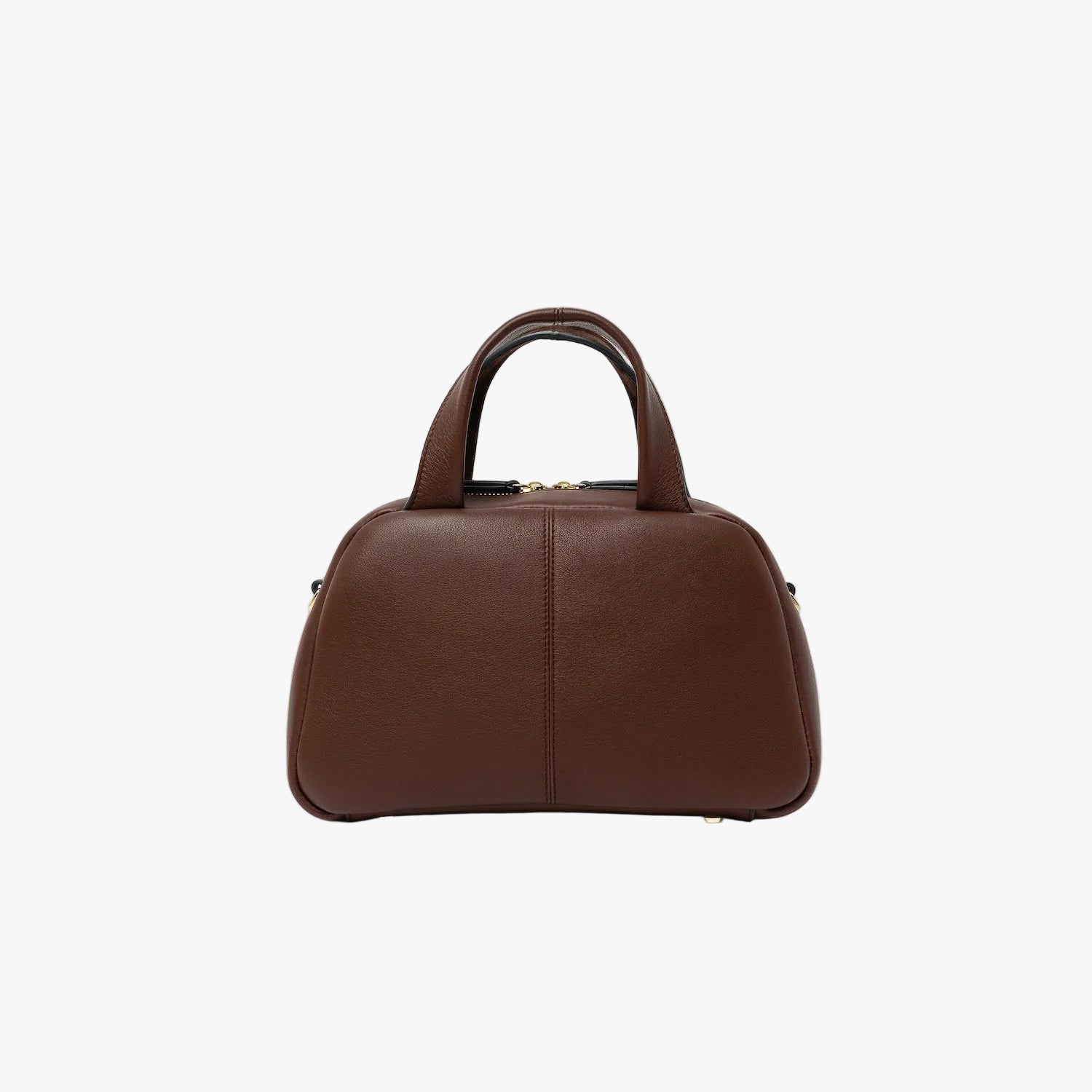 Smooth leather back panel of STOW London's Mini Bowling bag in Chocolate leather featuring gold-coated stainless steel hardware and four feet on the base on a light grey background