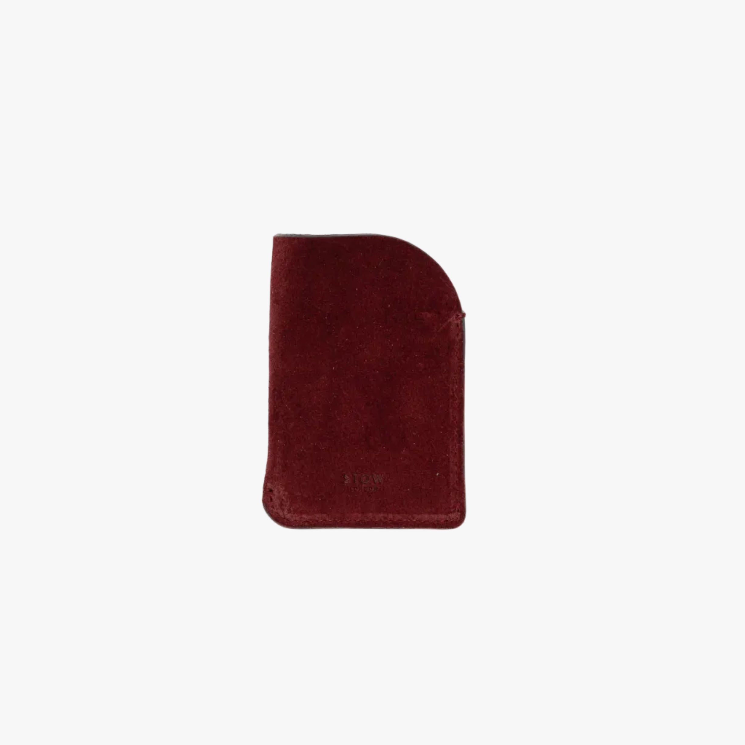 STOW London's Mini Cardholder in Burgundy Suede leather on a light grey background featuring a small embossed logo on the front bottom