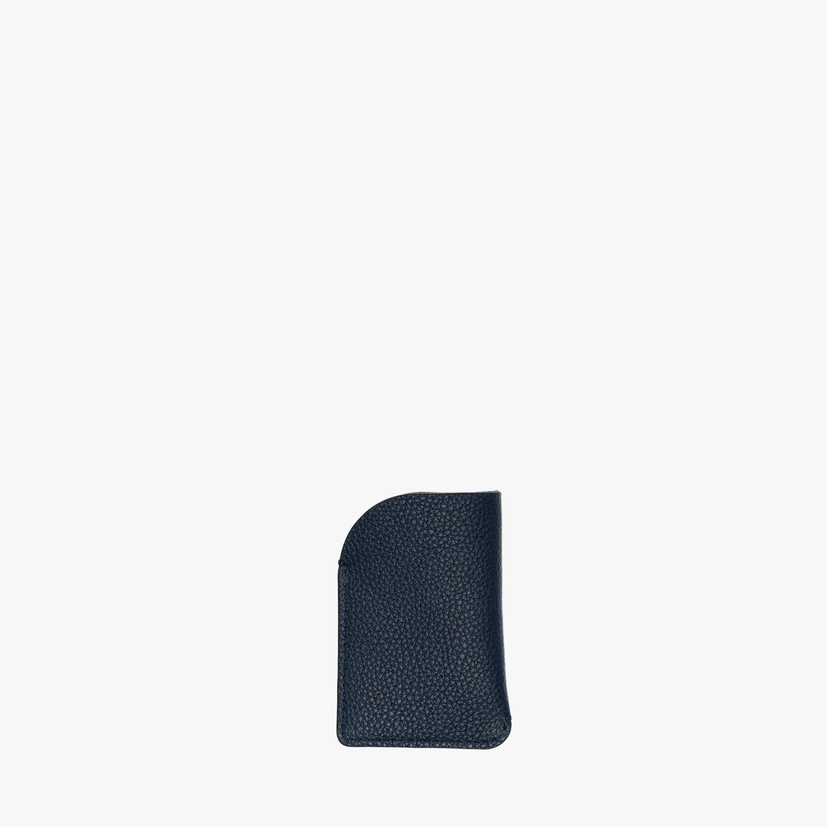 Back panel of STOW London's Mini Cardholder in Navy pebbled leather on a light grey background