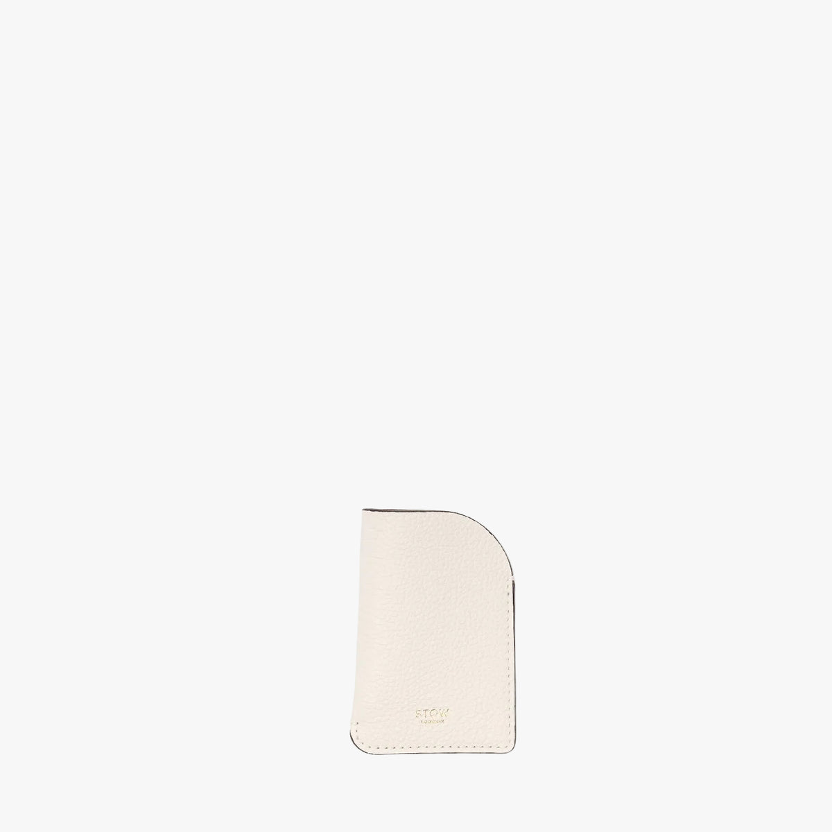 STOW London's Mini Cardholder in Spring Moon pebbled leather on a light grey background featuring a small gold embossed logo on the front bottom