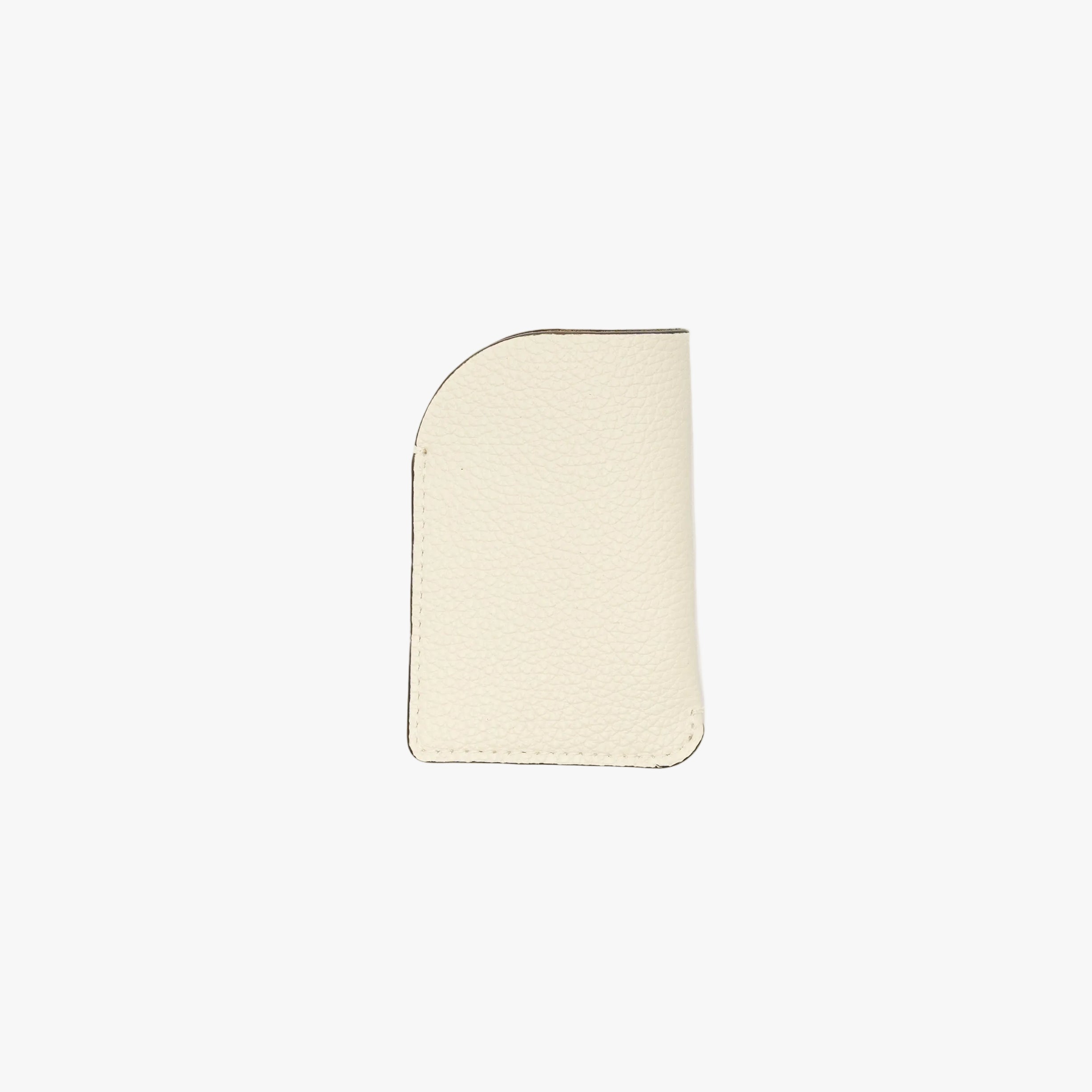 STOW London's Mini Cardholder in Spring Moon pebbled leather on a light grey background