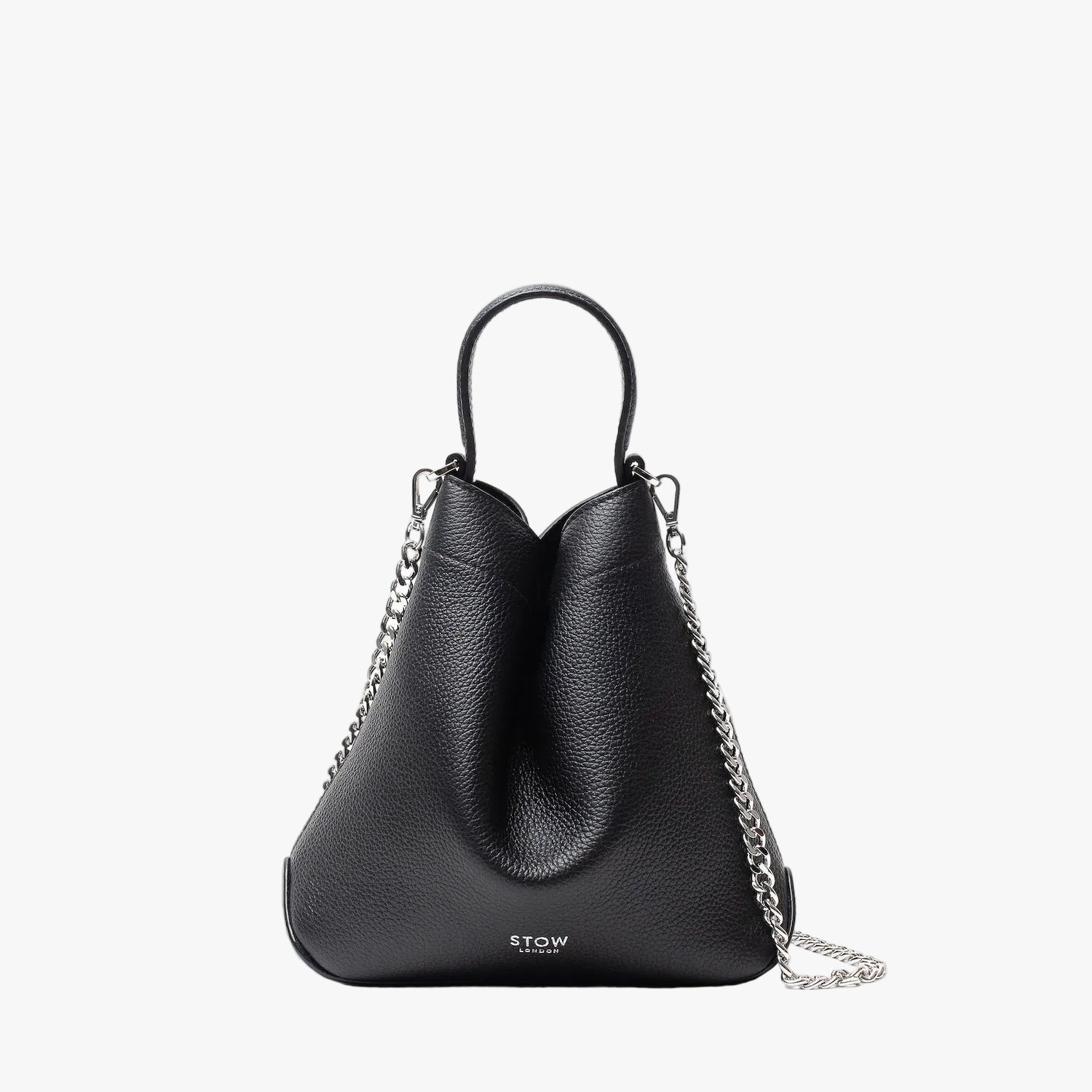 Stow London's Mini Curve in Black pebbled leather and detachable silver chain crossbody strap on a light grey background