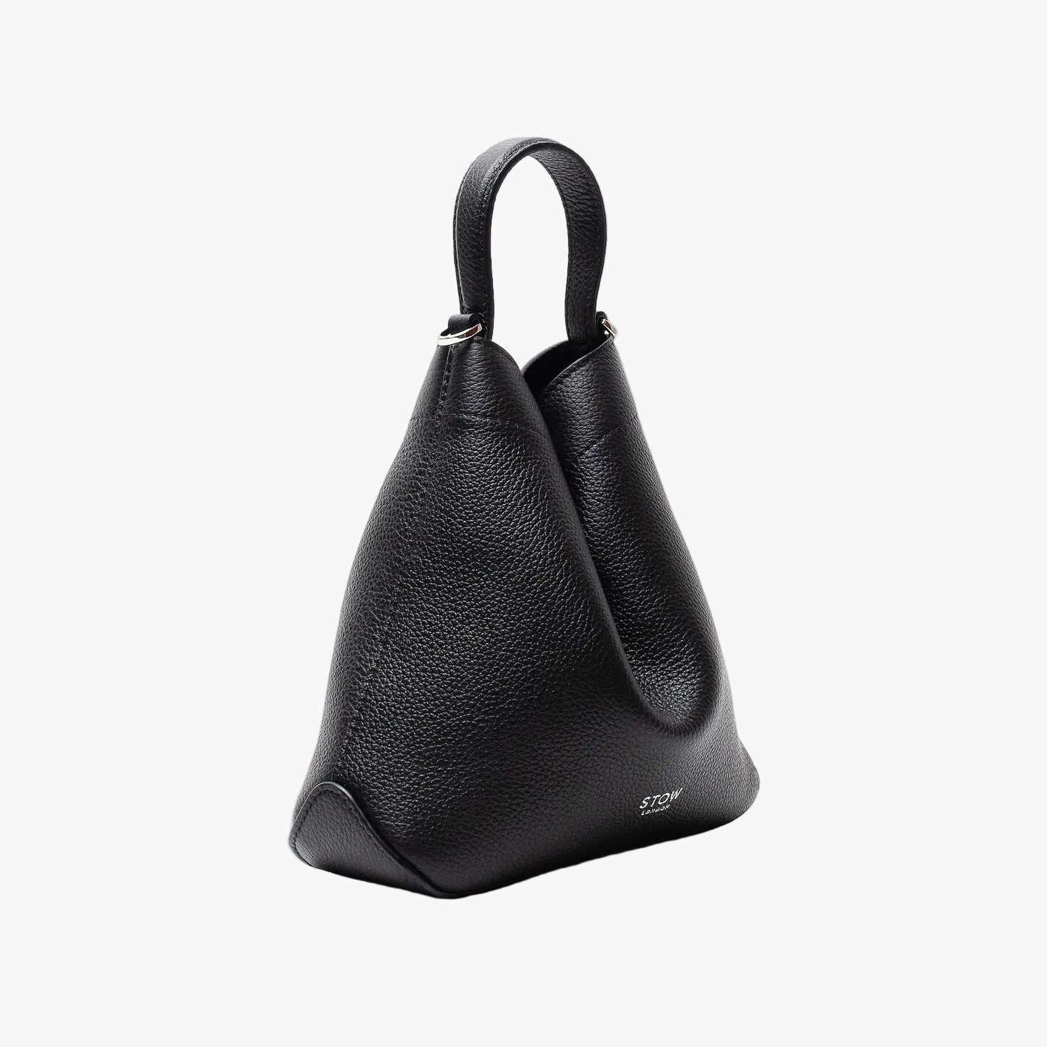 Off-axis view of Stow London's Mini Curve in Black pebbled leather featuring silver hardware on a light grey background