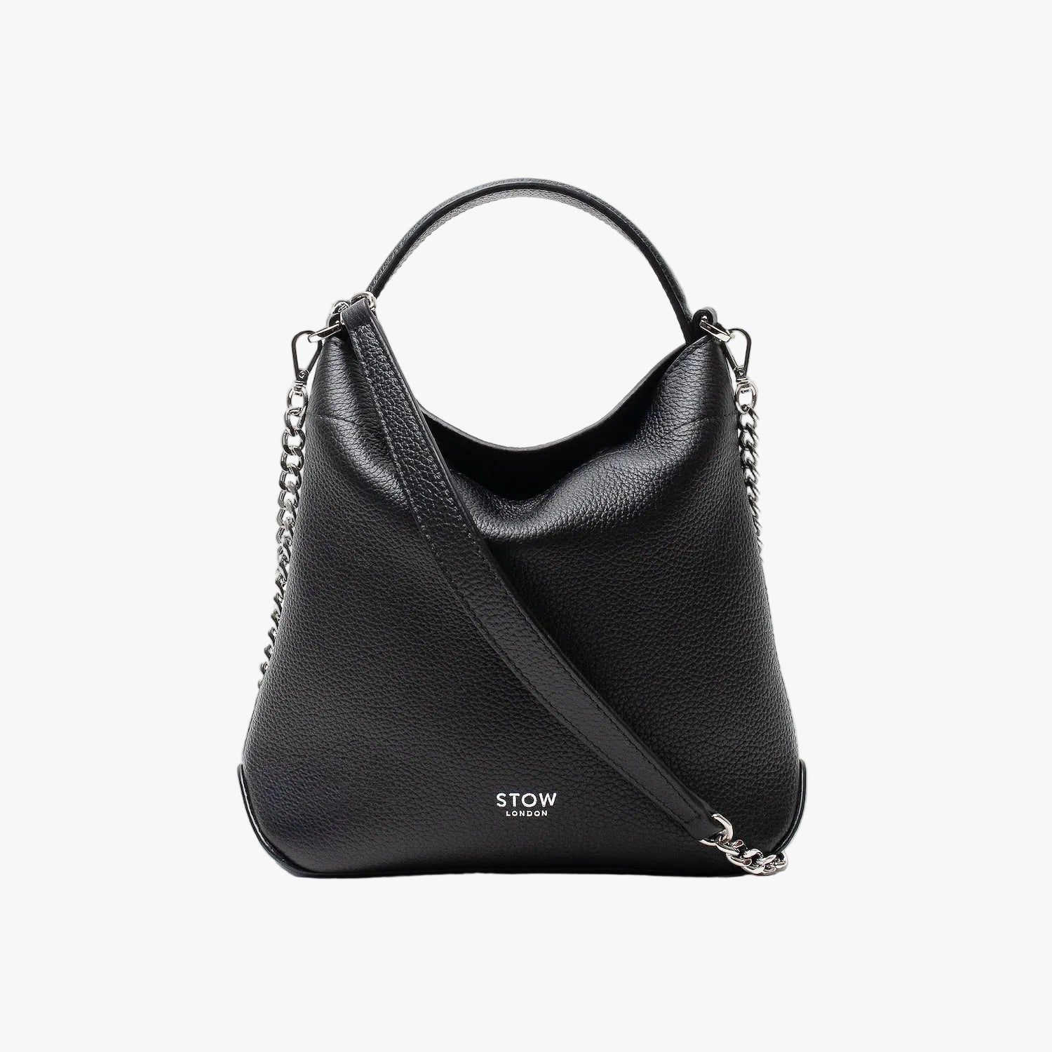 Stow London's Mini Curve in Black pebbled leather and detachable silver chain crossbody strap styled as a flap bag on a light grey background