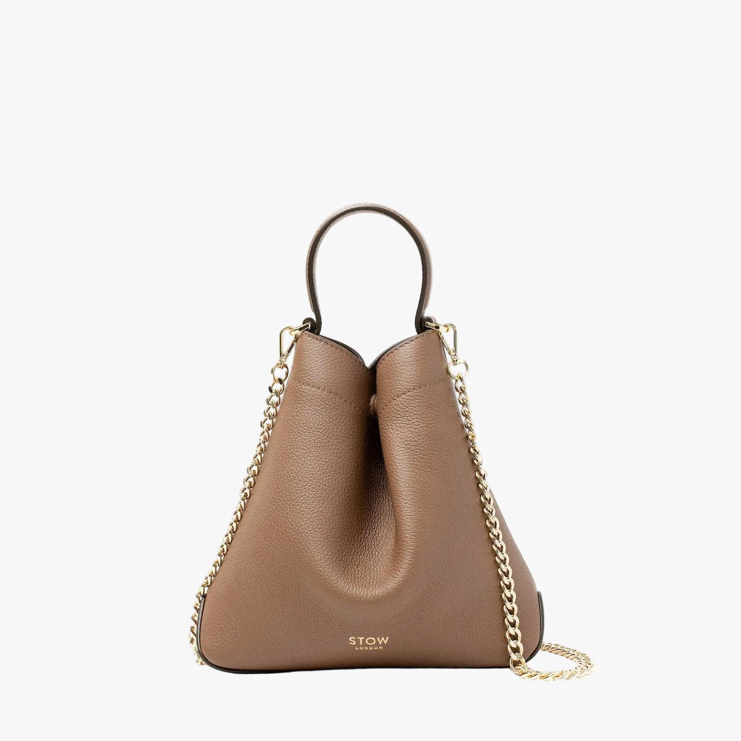 STOW London's Mini Curve in Mocha pebbled leather and detachable gold plated chain strap featuring gold-coated stainless steel hardware on a light grey background