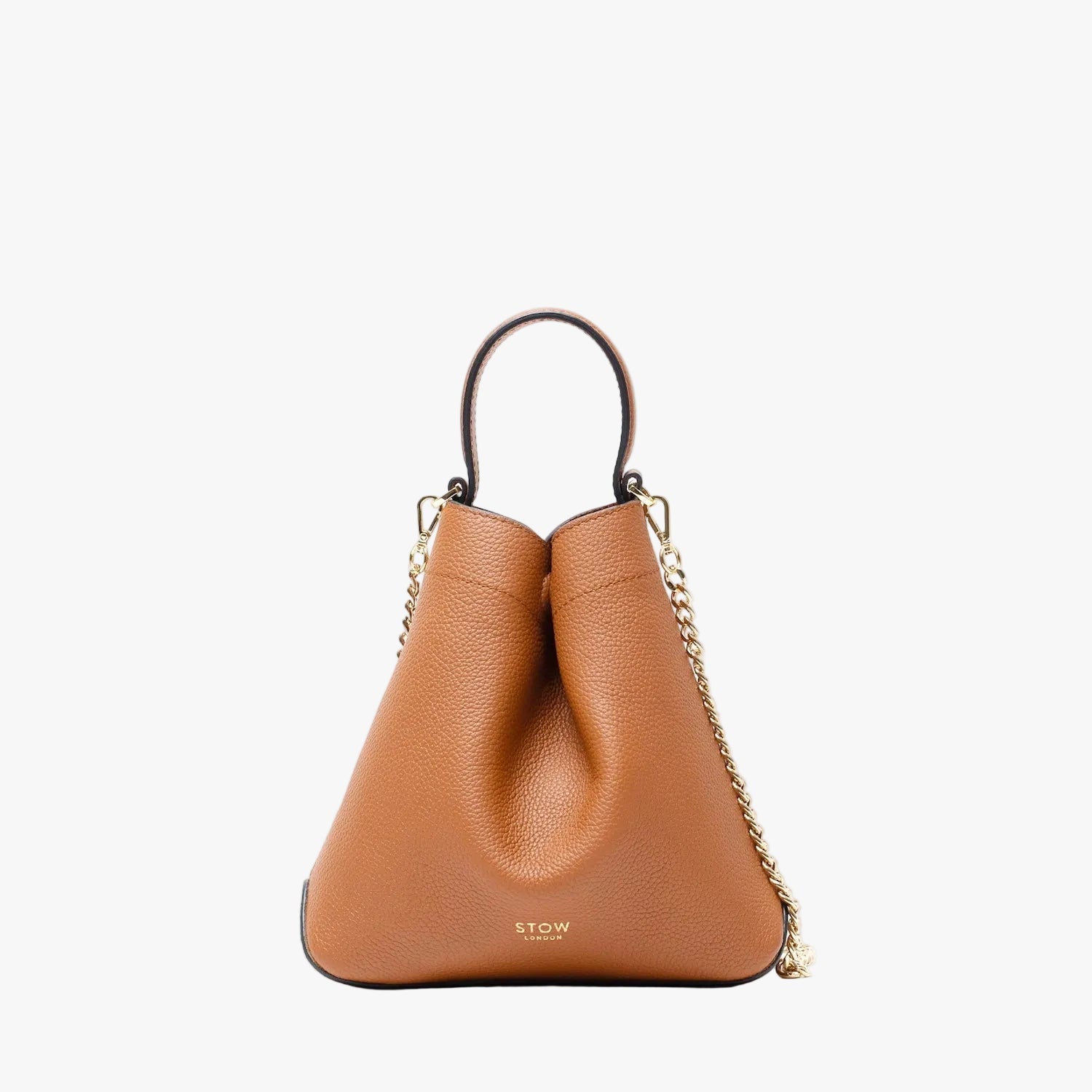 STOW London's Mini Curve in Earth tan pebbled leather and detachable gold chain crossbody strap on a light grey background