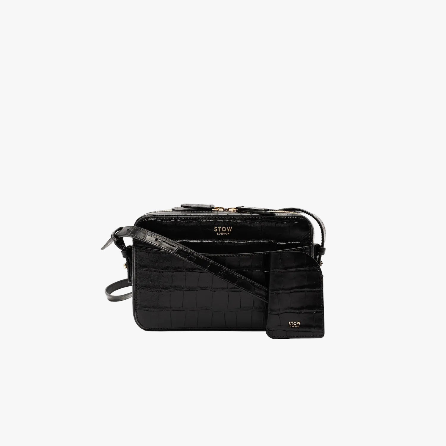 STOW London's Mini Cardholder in Black Embossed Croc leather with the matching Camera Bag on a light grey background featuring a small gold embossed logo on the front bottom