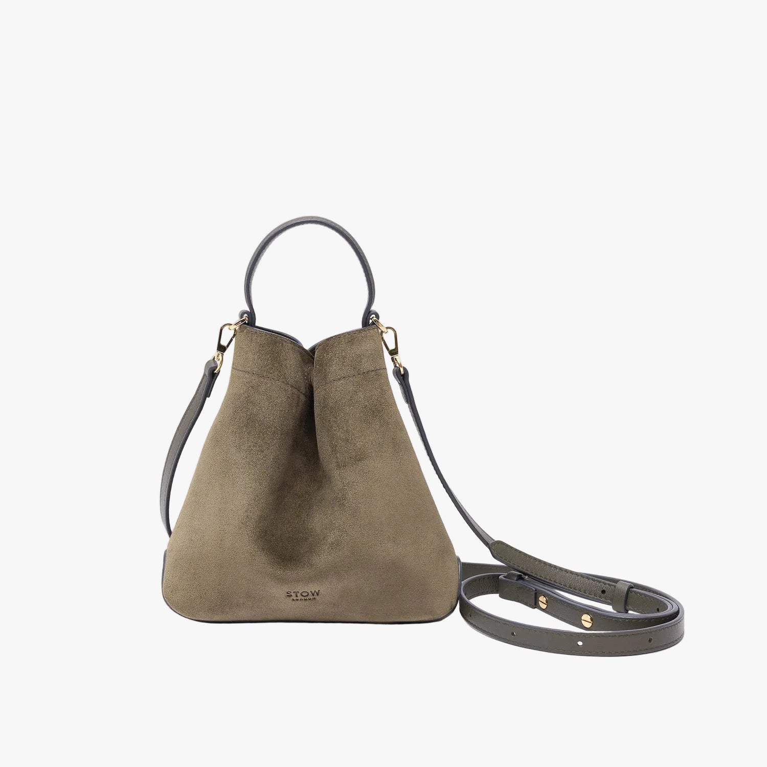 STOW London's Mini Curve in Dark Green suede leather and detachable leather crossbody strap on a light grey background