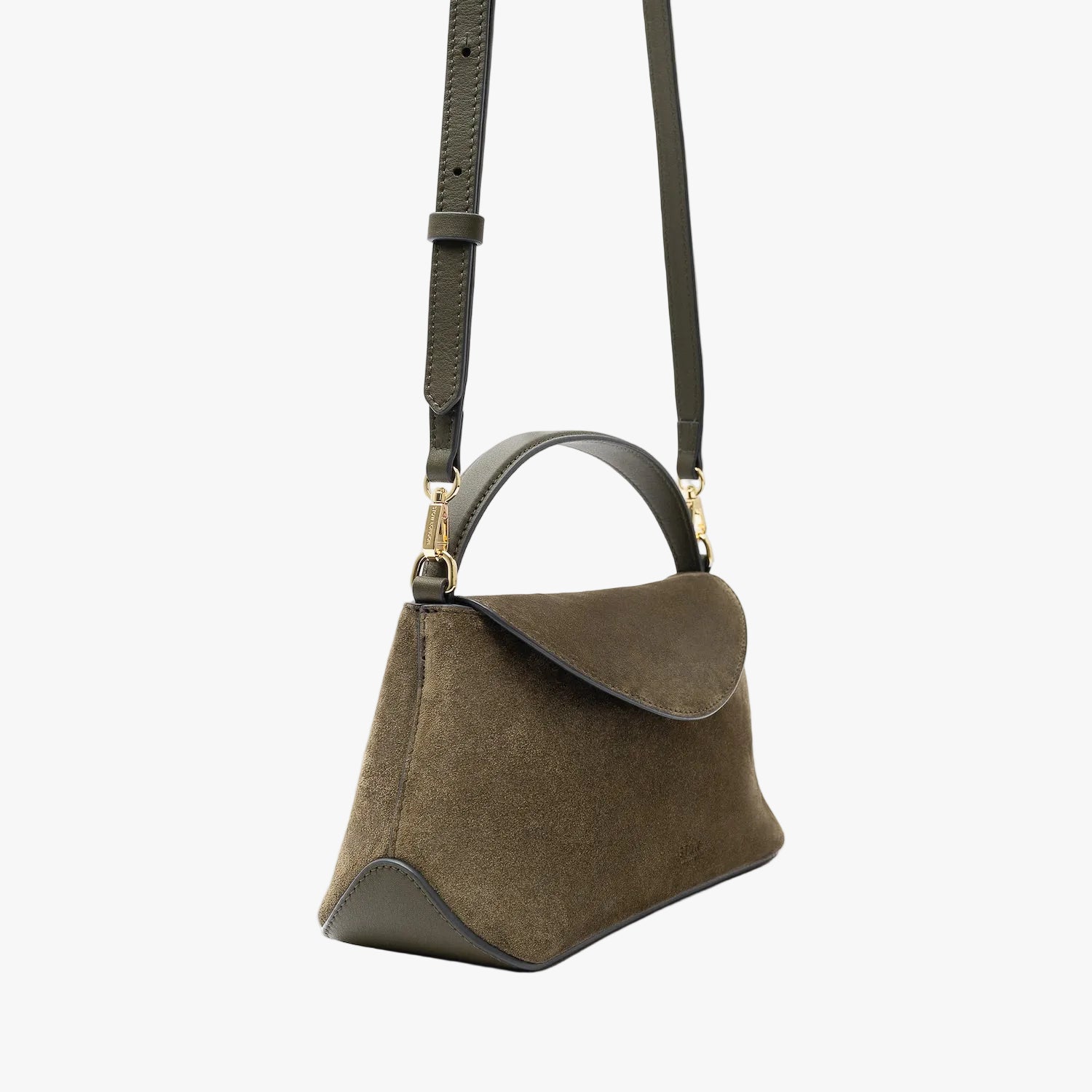 Off-axis view of STOW London's Mini East West in Dark Green suede leather and detachable crossbody strap featuring gold-coated stainless steel hardware on a light grey background