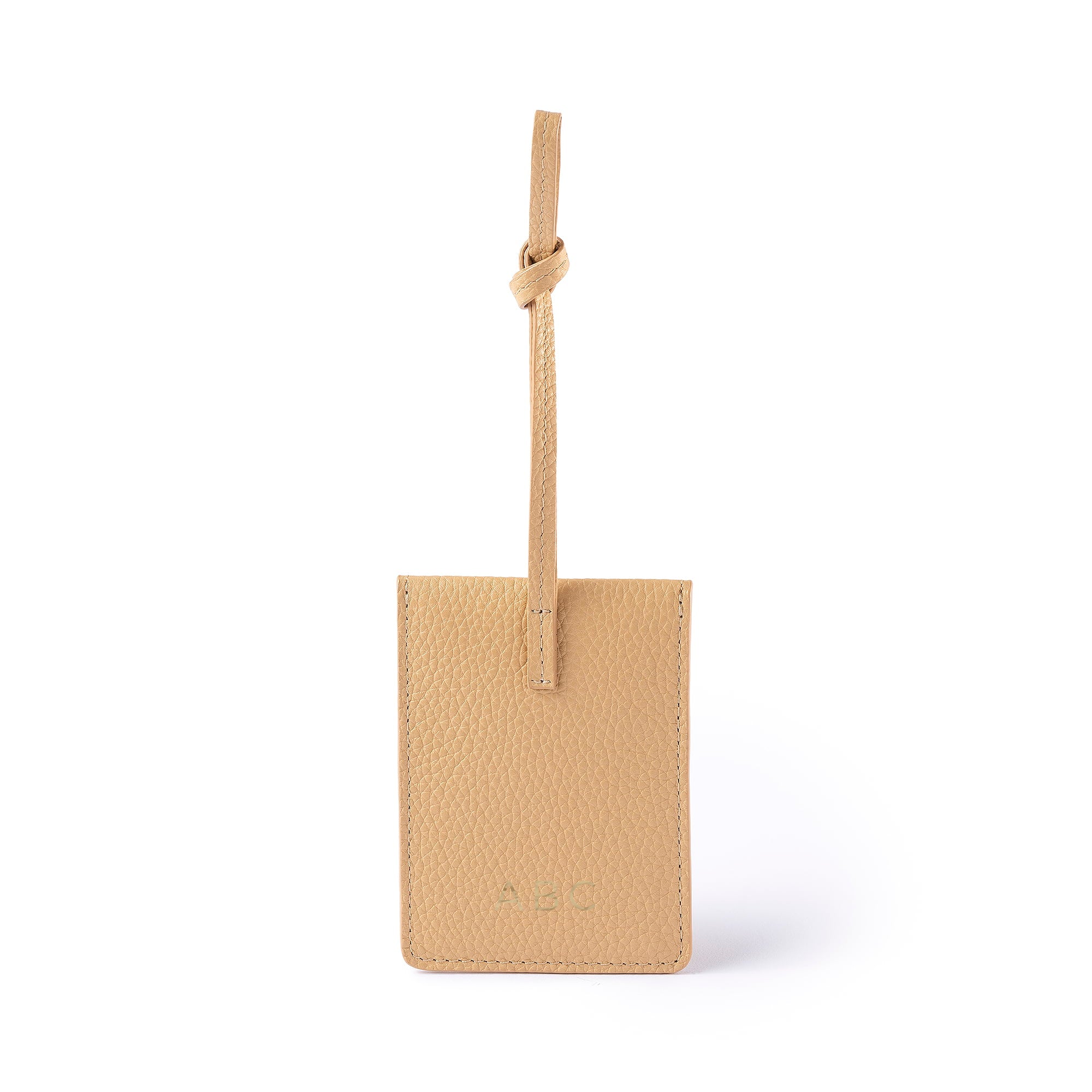 STOW London Leather Multi Tag in Almond pebbled leather with personalised initials on the back.