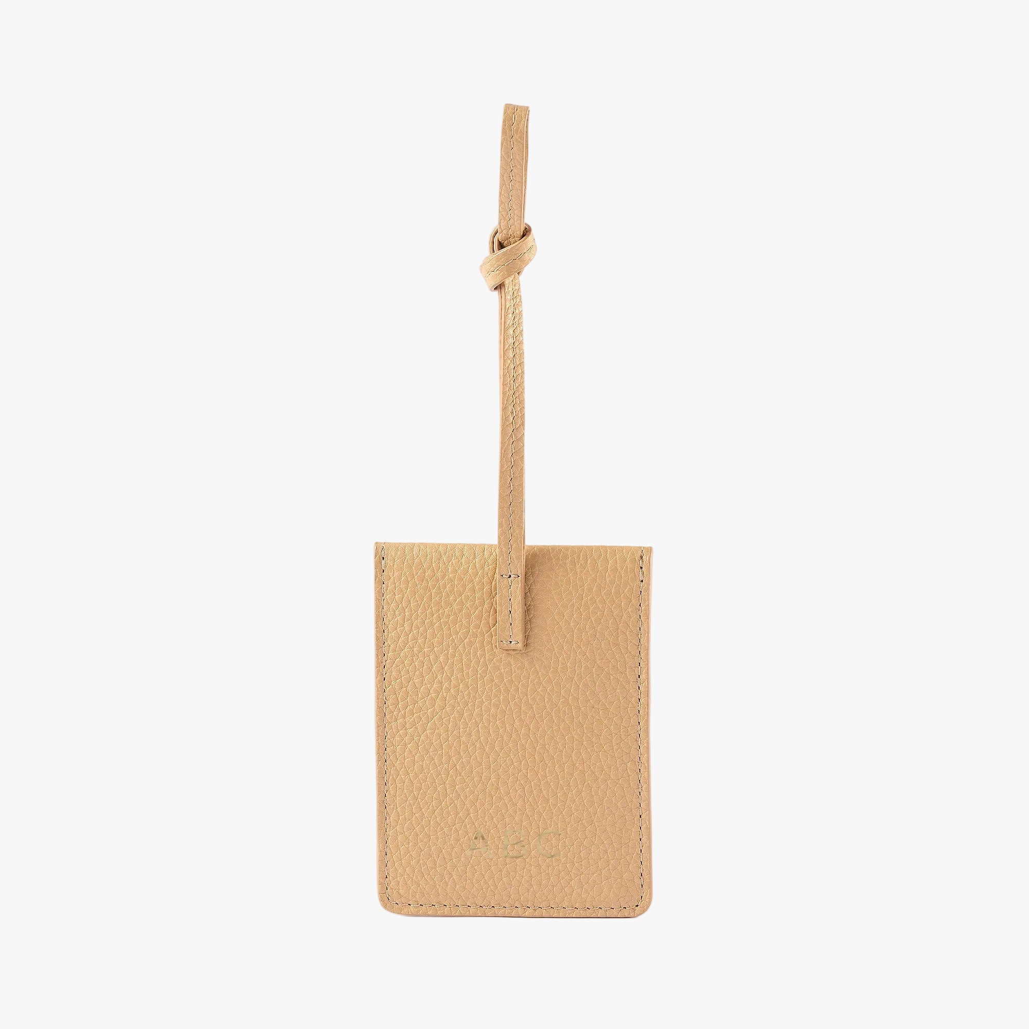 STOW London Leather Multi Tag in Almond pebbled leather with personalised initials on the back.