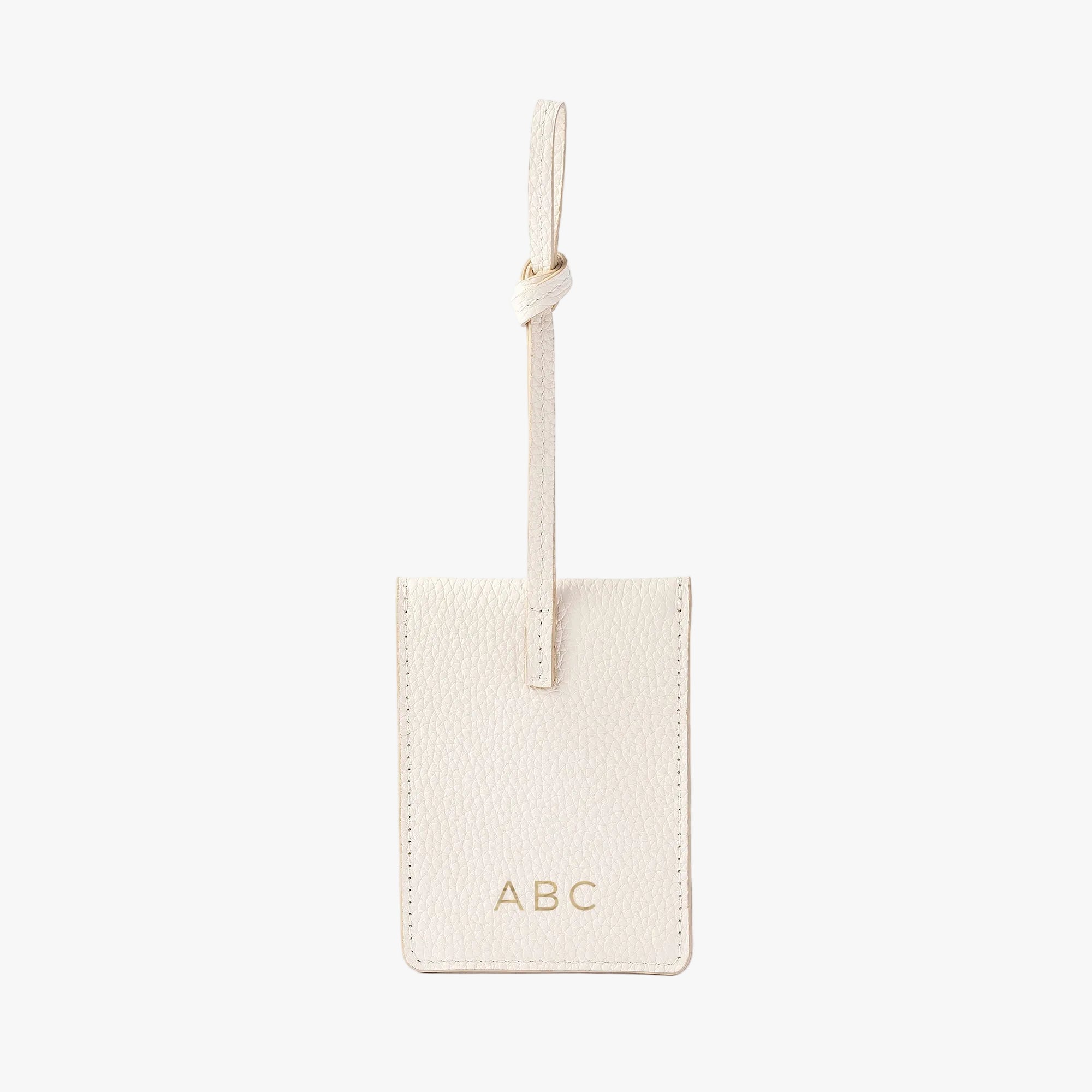STOW London Leather Multi Tag in Spring Moon pebbled leather with personalised initials on the back.