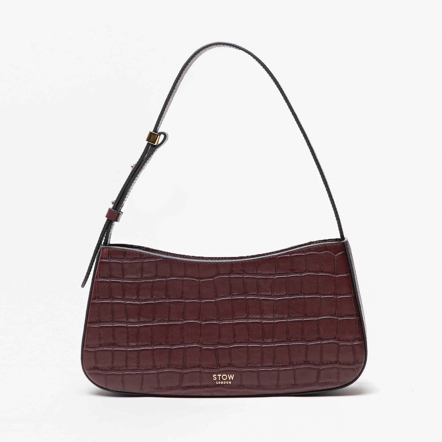 Stow London's Post Shoulder in Burgundy Embossed Croc leather on a light grey background featuring gold-coated stainless steel hardware