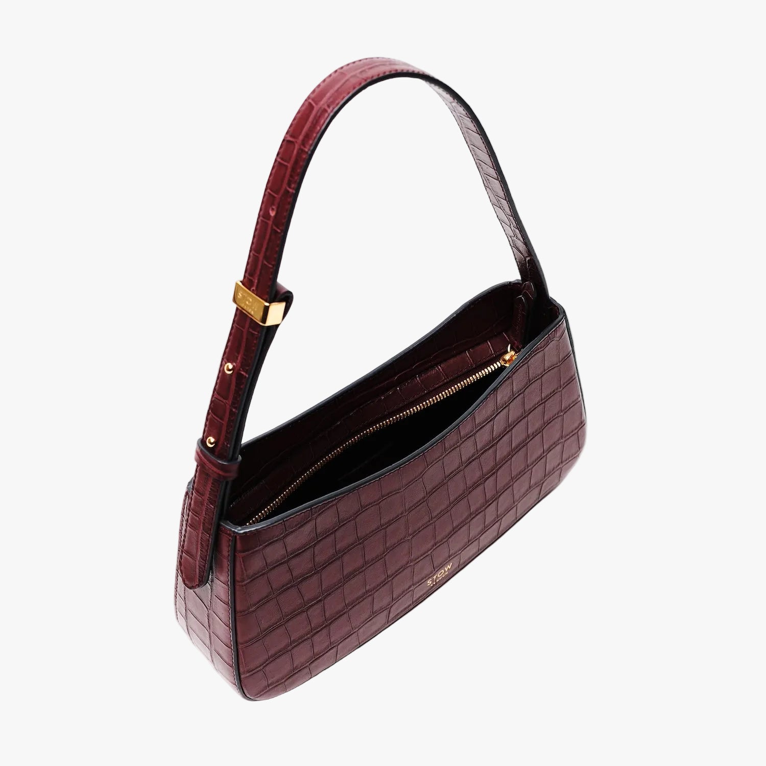 Top view of Stow London's Post Shoulder in Burgundy Embossed Croc leather with zip open showing black cotton interior on a light grey background featuring gold-coated stainless steel hardware