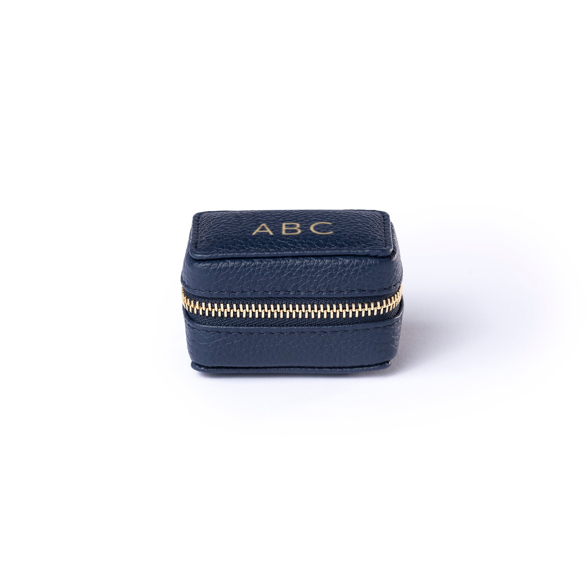 STOW London Mini Essentials Case in Navy leather with personalisation on top