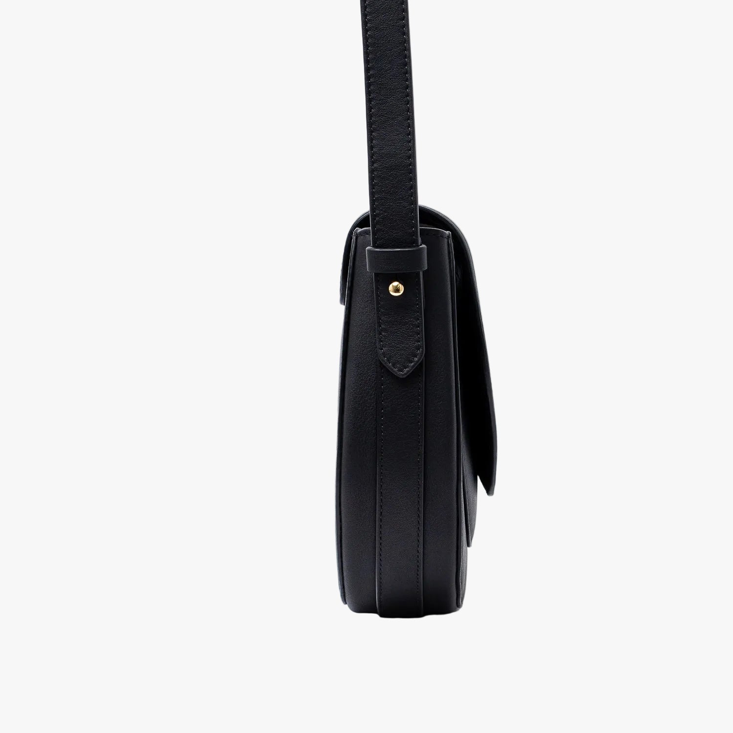 Side view of STOW London's Saddle bag in Black smooth leather on a light grey background