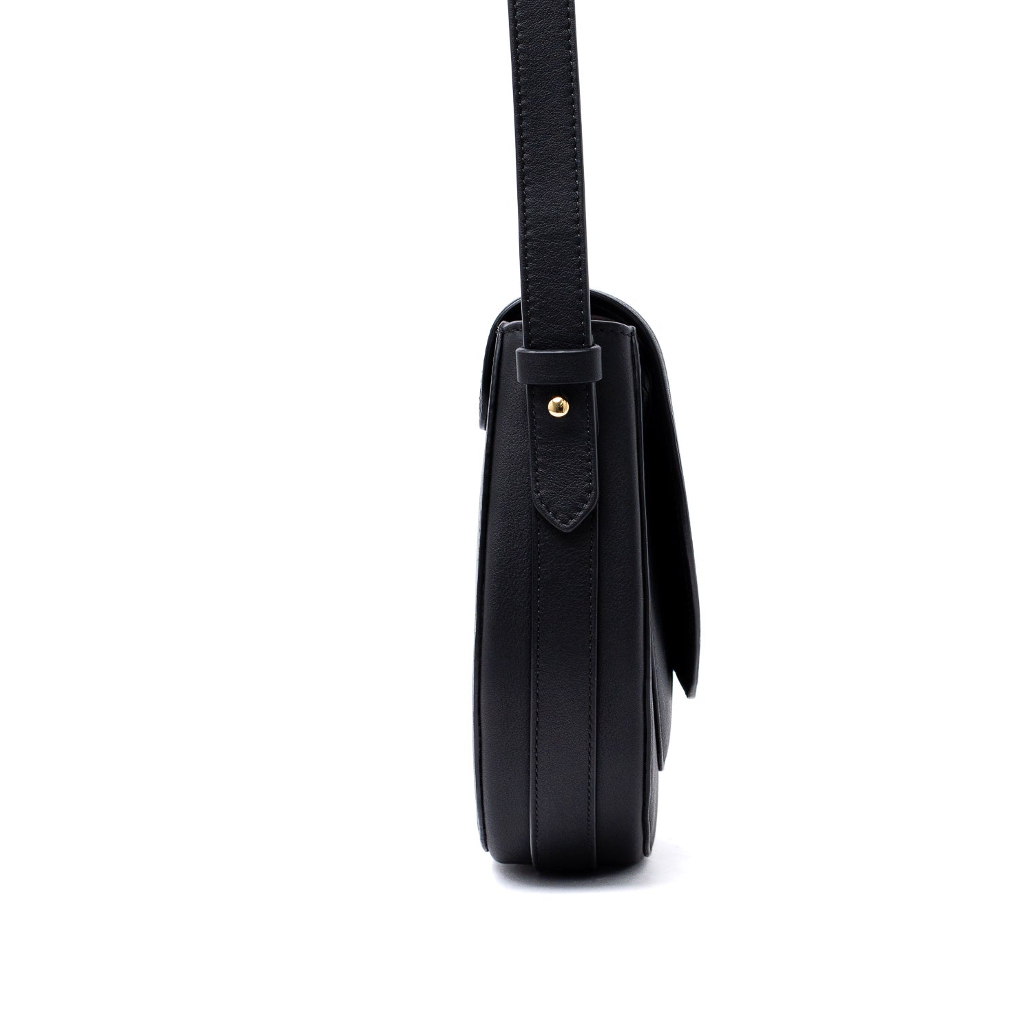 Side view of STOW London's Saddle bag in Black smooth leather and detachable strap featuring gold-coated stainless steel hardware on a white background
