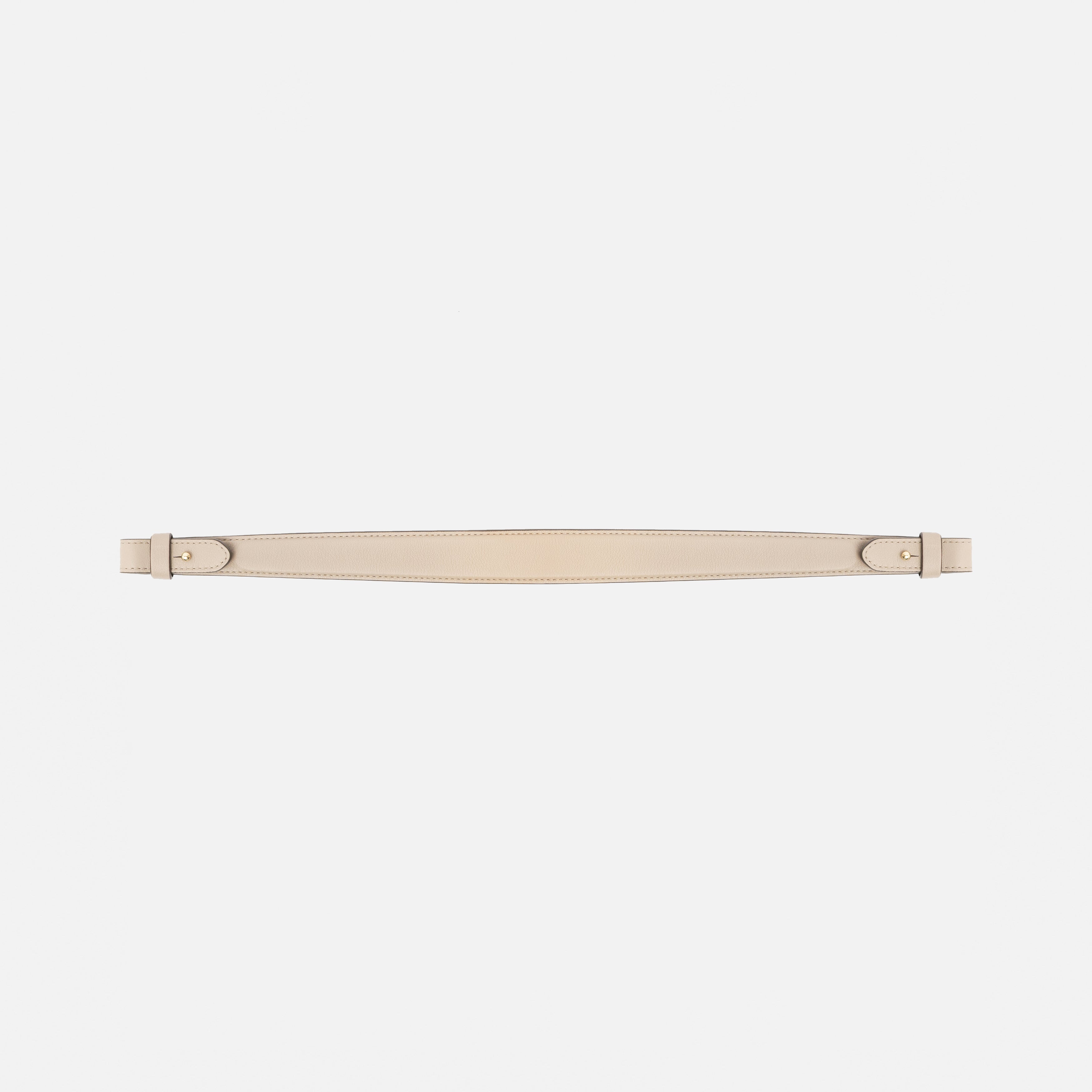 Detachable shoulder strap for STOW London's Curve, Midi Curve and East West in Camel smooth leather on a light grey background featuring gold hardware