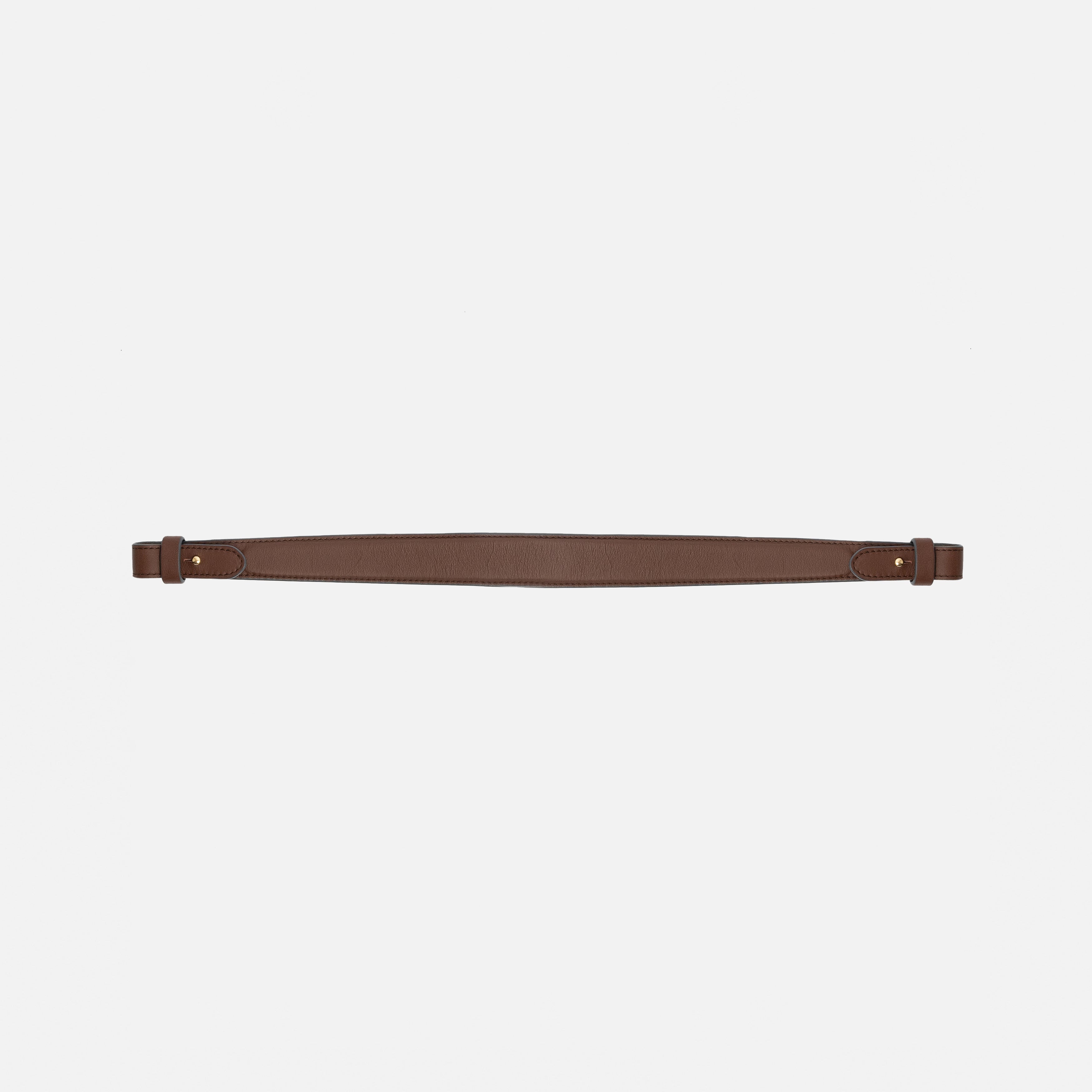 Detachable shoulder strap for STOW London's Curve, Midi Curve and East West in Chocolate smooth leather on a light grey background featuring gold hardware