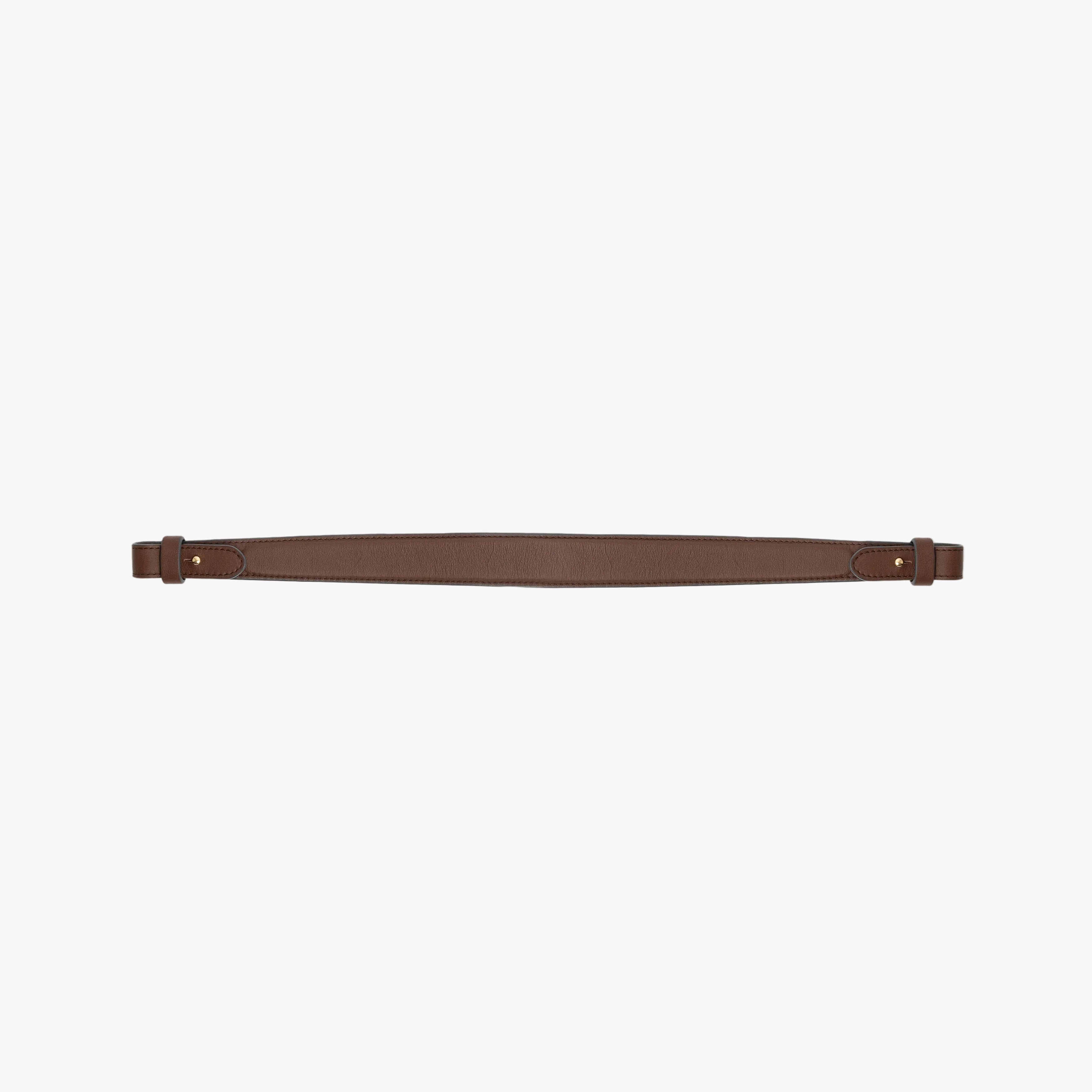 Detachable shoulder strap for STOW London's Curve, Midi Curve and East West in Chocolate smooth leather on a light grey background featuring gold hardware