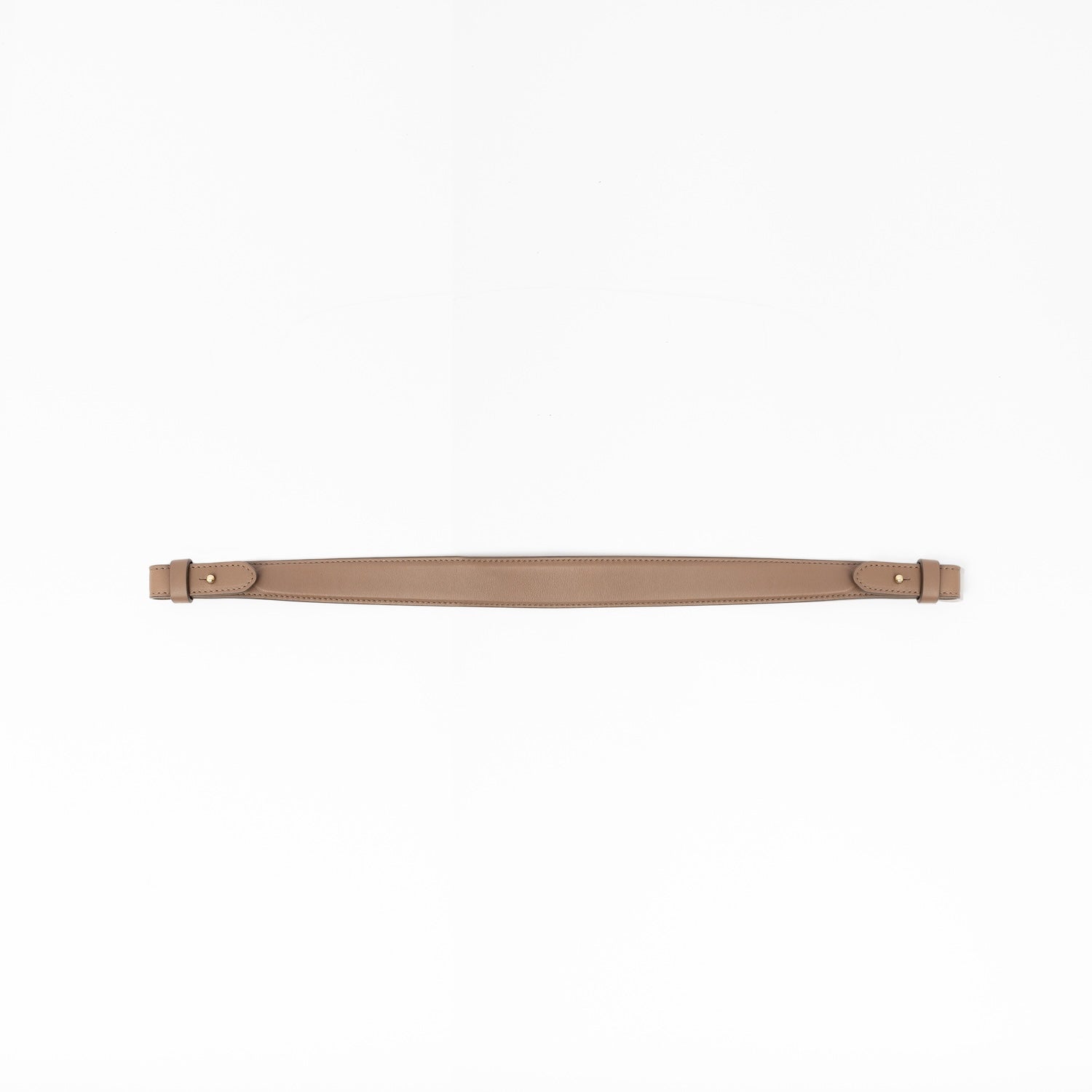 Detachable shoulder strap for STOW London's Curve, Midi Curve and East West in Mocha smooth leather on a light grey background featuring gold hardware