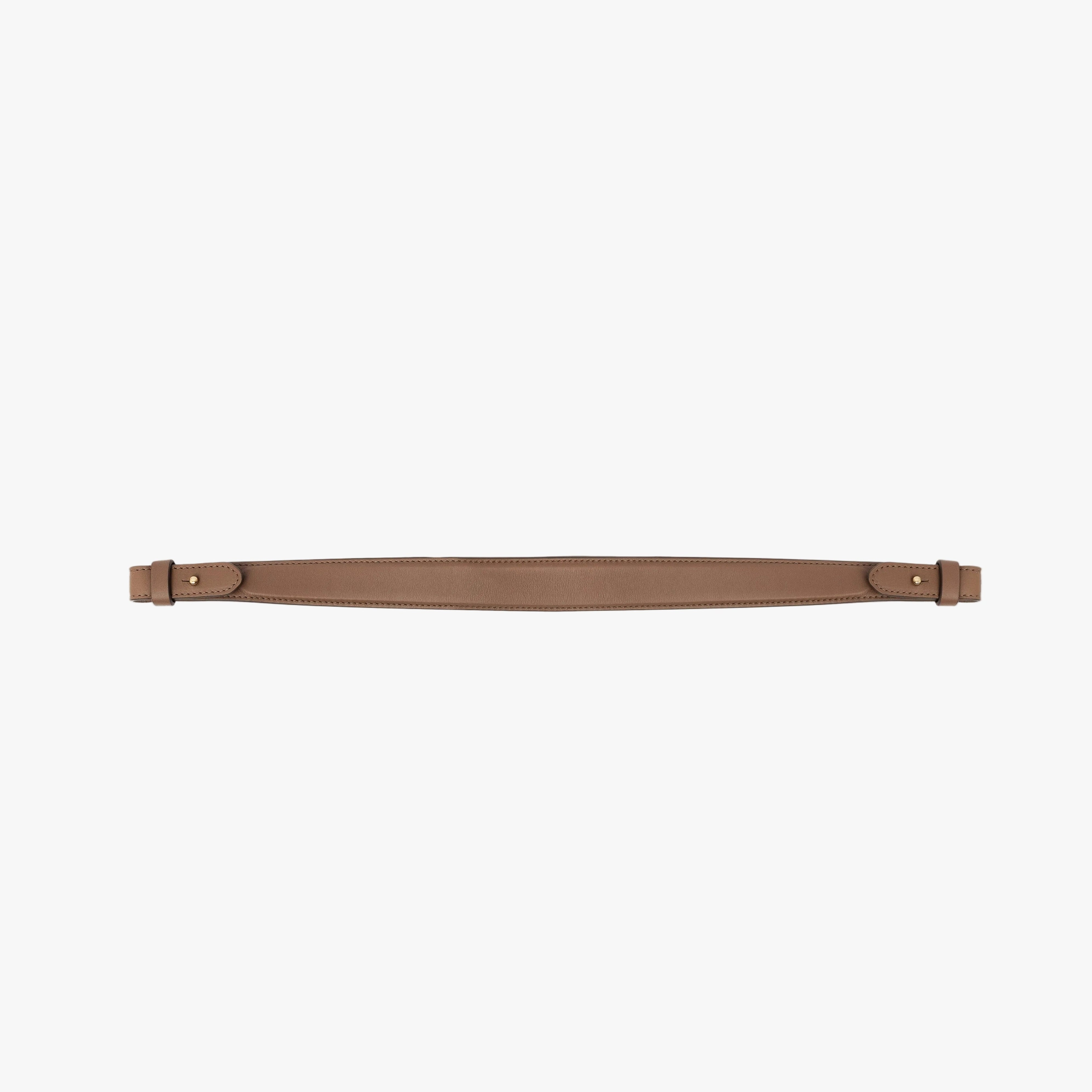 Detachable shoulder strap for STOW London's Curve, Midi Curve and East West in Mocha smooth leather on a light grey background featuring gold hardware