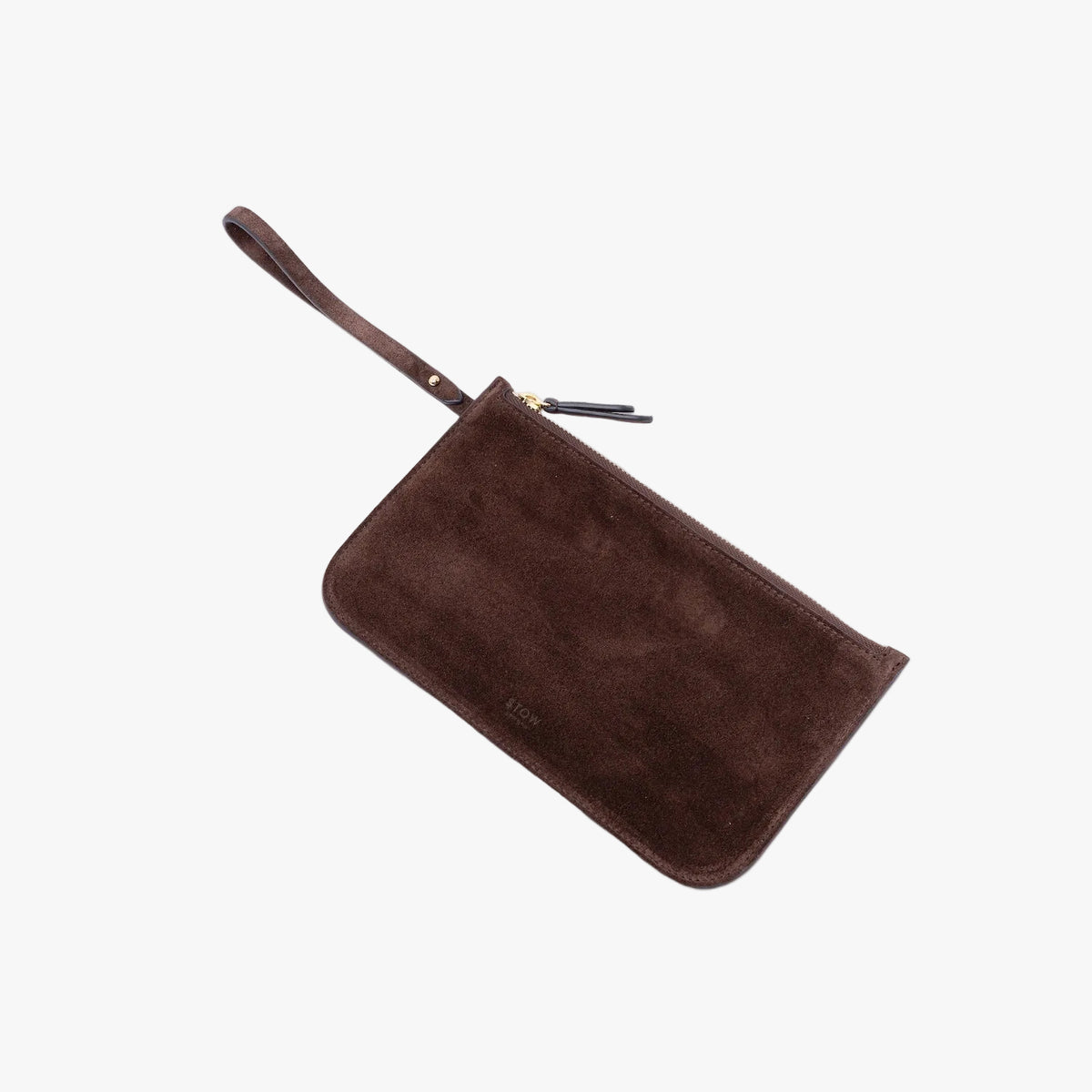 The matching, detachable internal zip pouch from STOW London's Everyday Tote bag in Chocolate suede on a light grey background featuring a small STOW London logo embossed on the front panel