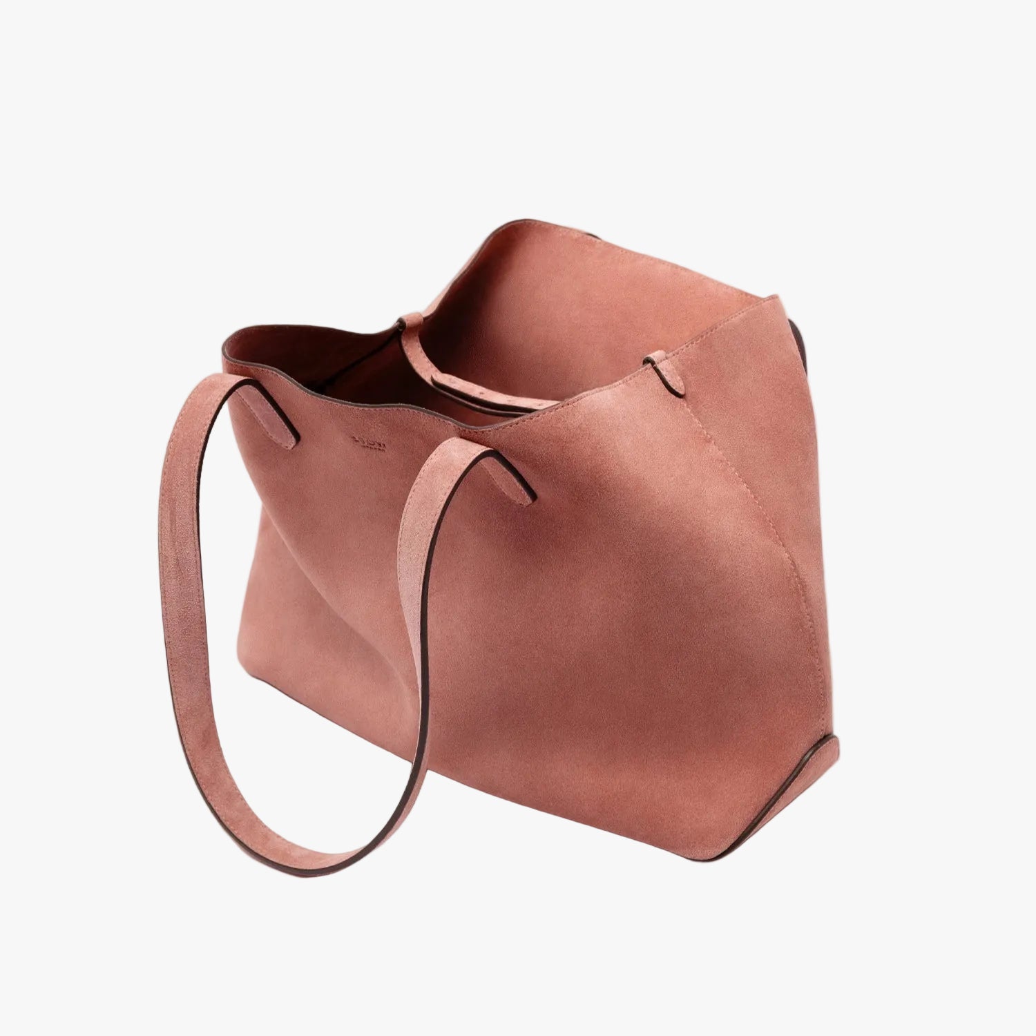 STOW London's Everyday Tote bag in Hazy Blush suede on a light grey background featuring a small STOW London logo embossed on the front panel