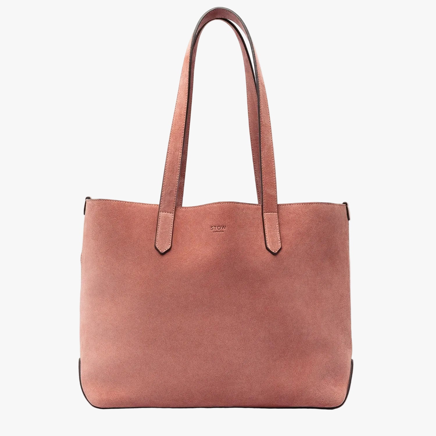 STOW London's Everyday Tote bag in Hazy Blush suede on a light grey background featuring a small STOW London logo embossed on the front panel