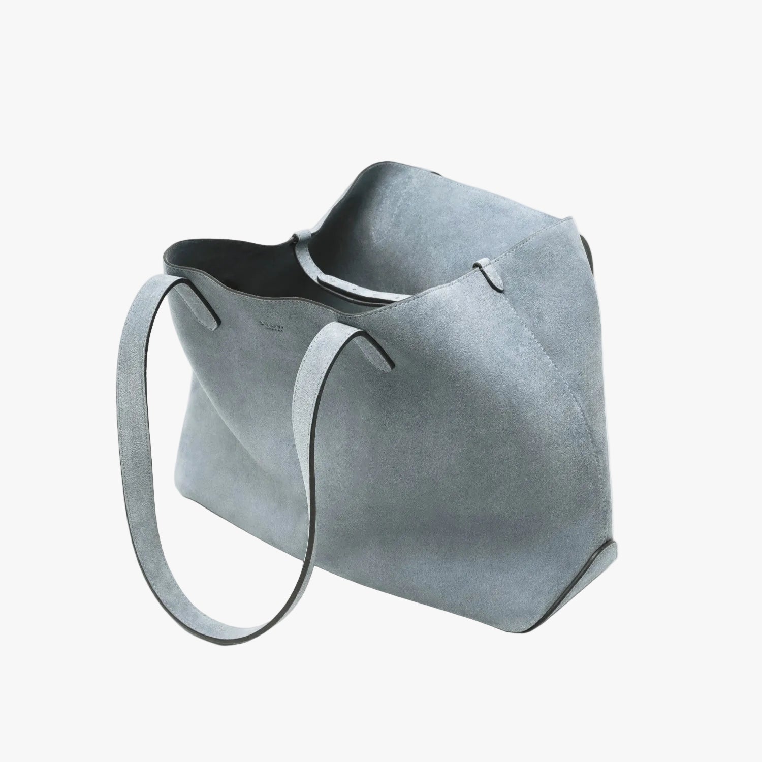 STOW London's Everyday Tote bag in Misty Blue suede on a light grey background featuring the matching suede interior and small STOW London logo embossed on the front panel