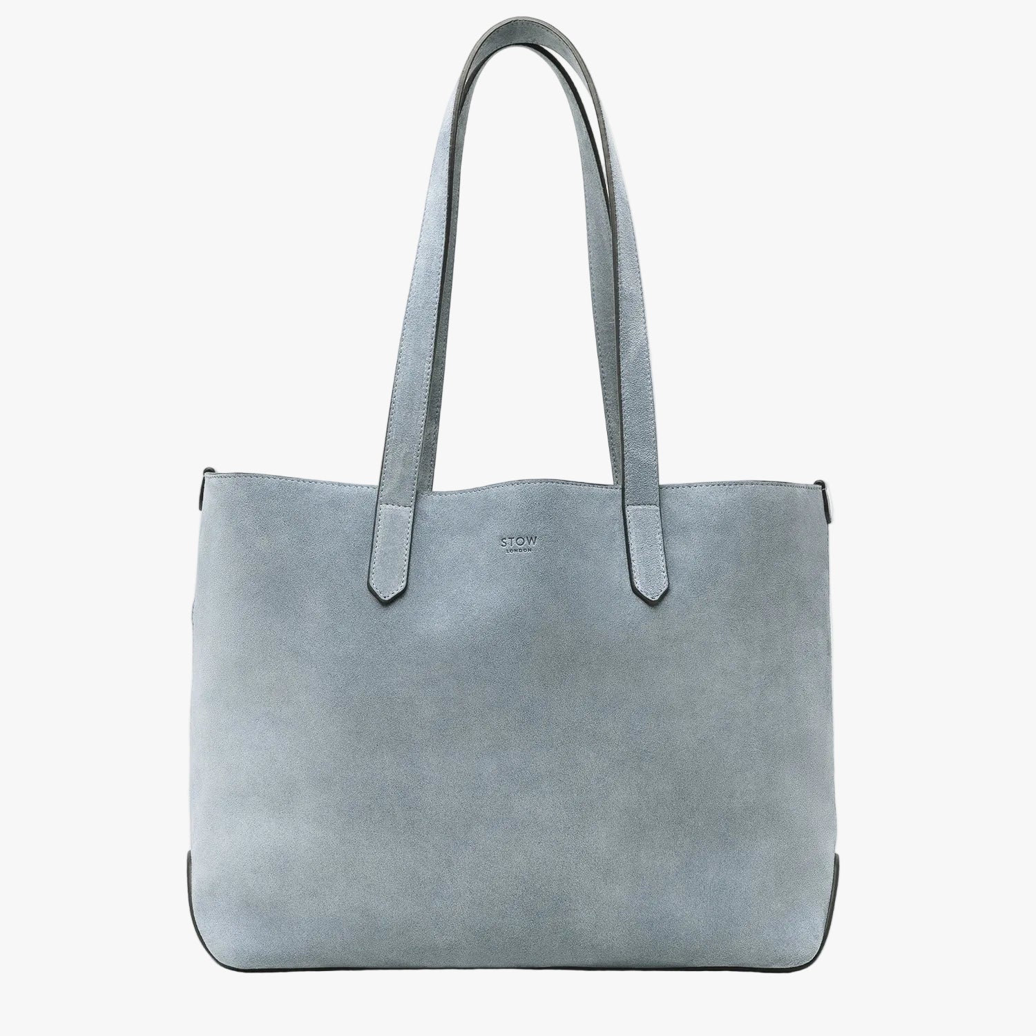 STOW London's Everyday Tote bag in Misty Blue suede on a light grey background featuring a small STOW London logo embossed on the front panel