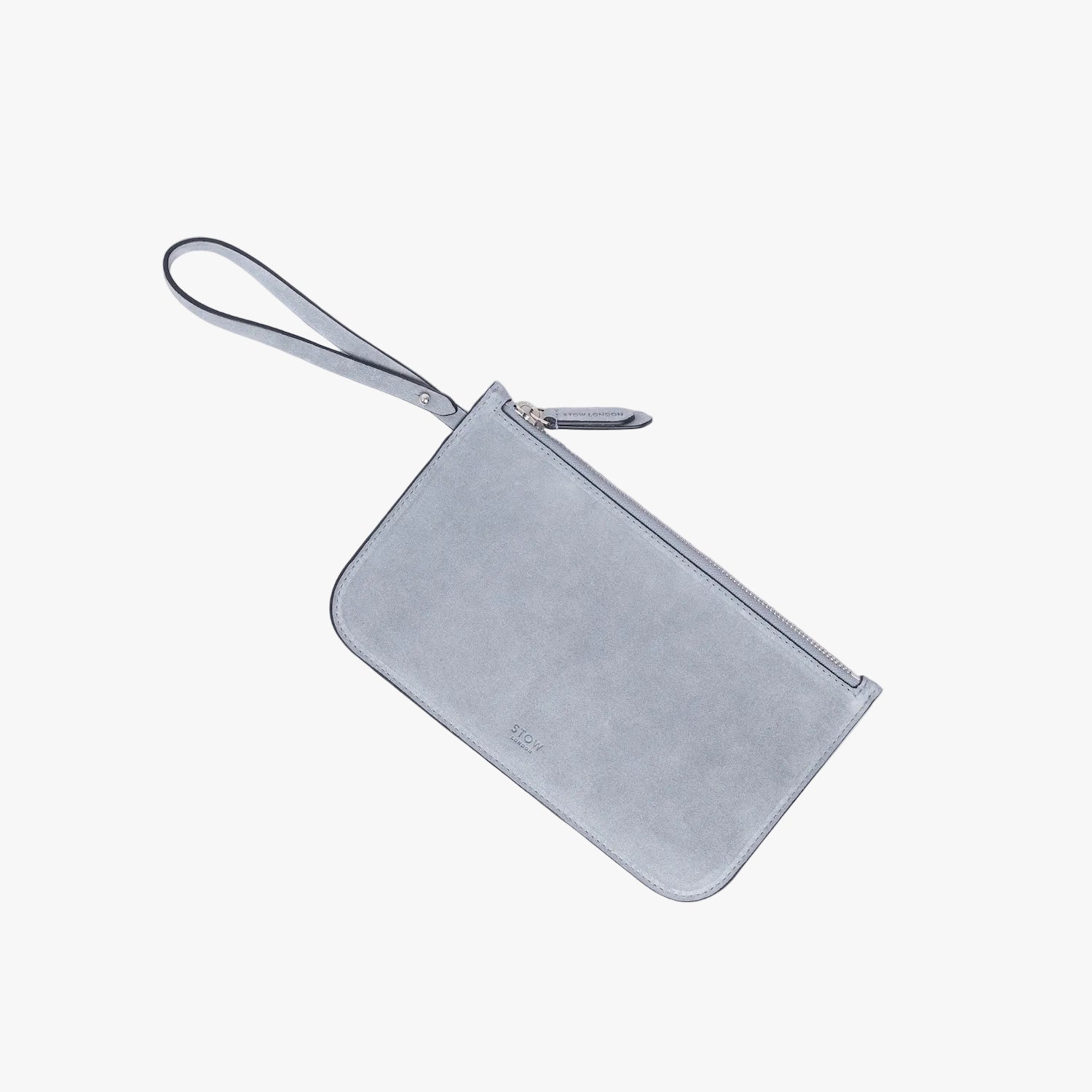 The detachable, internal zip pouch from STOW London's Everyday Tote bag in Misty Blue suede featuring silver hardware