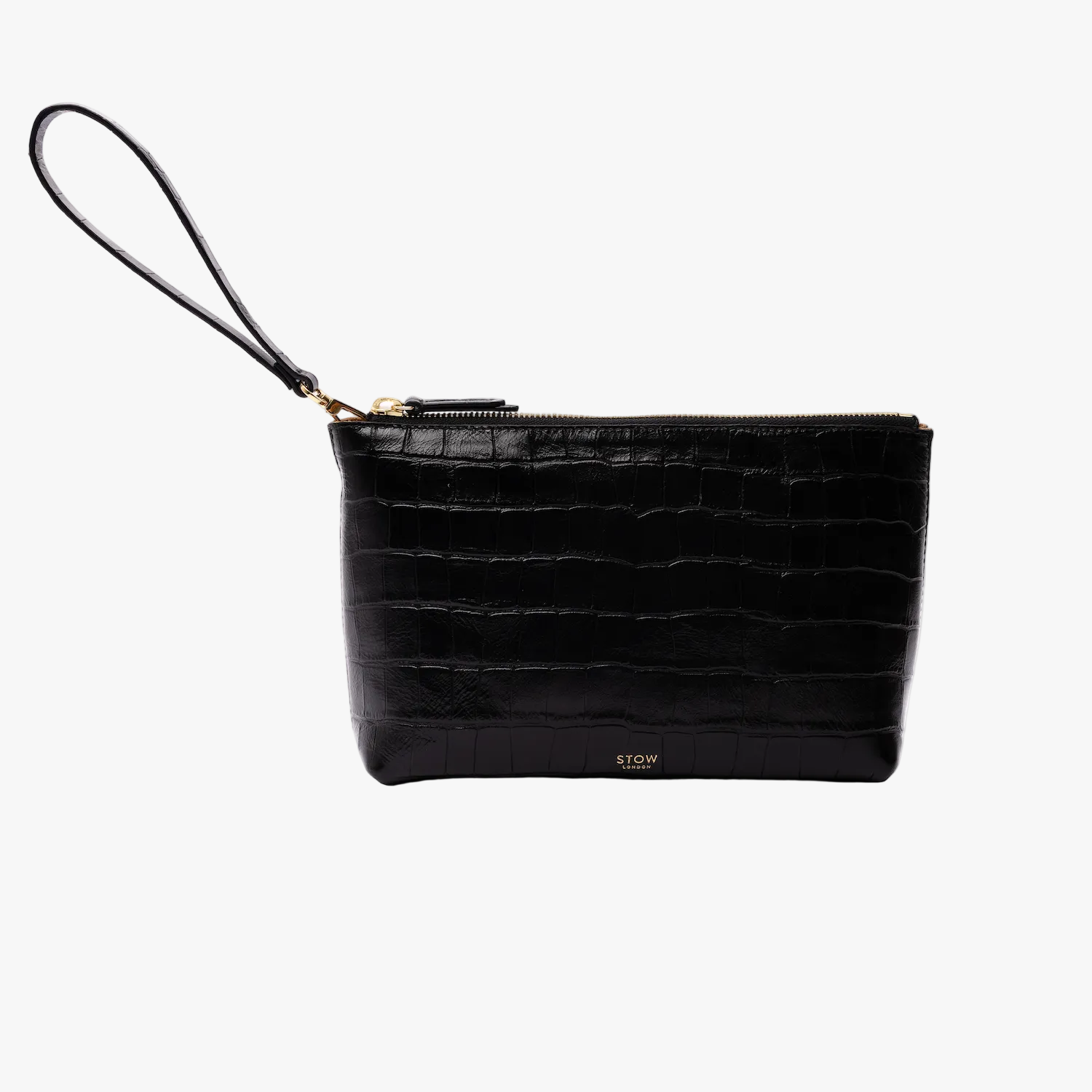 STOW London's travel pouch in Black Embossed Croc leather on a light grey background featuring the detachable wrist strap, a YKK zip and a fine gold embossed logo on the front