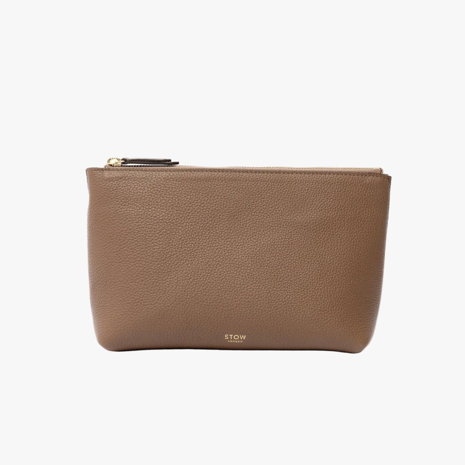 STOW London's travel pouch in Mocha pebbled leather on a light grey background featuring a YKK zip and a fine gold embossed logo on the front