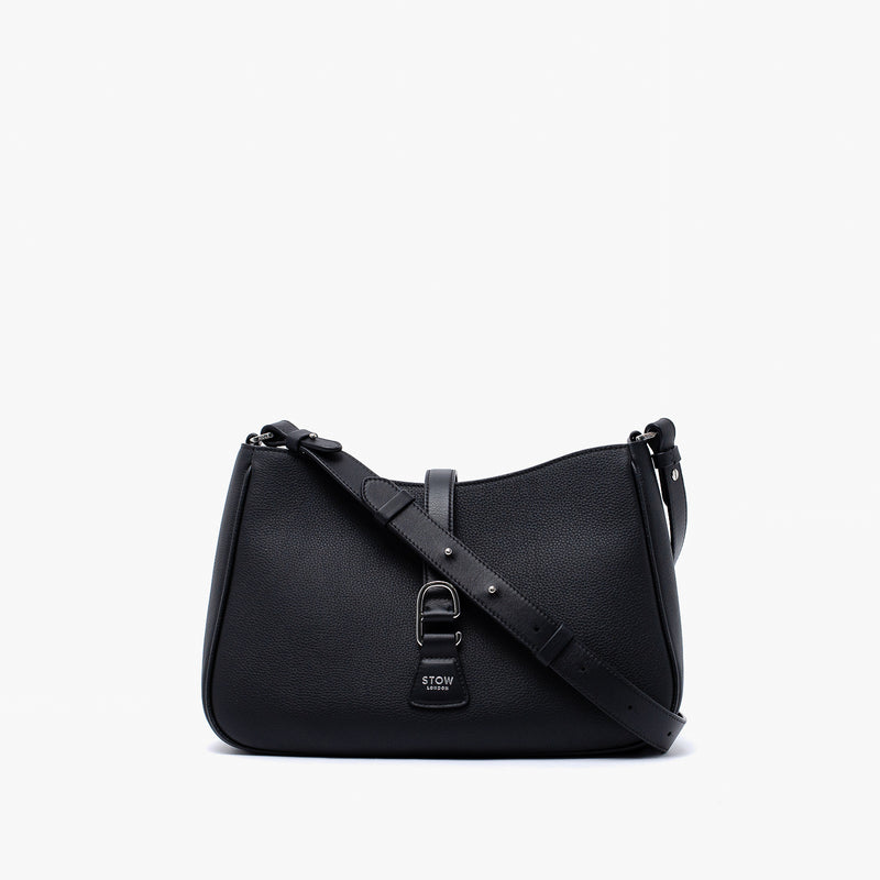 STOW London's Beth bag and detachable crossbody strap in Black leather featuring silver stainless steel hardware on a white background