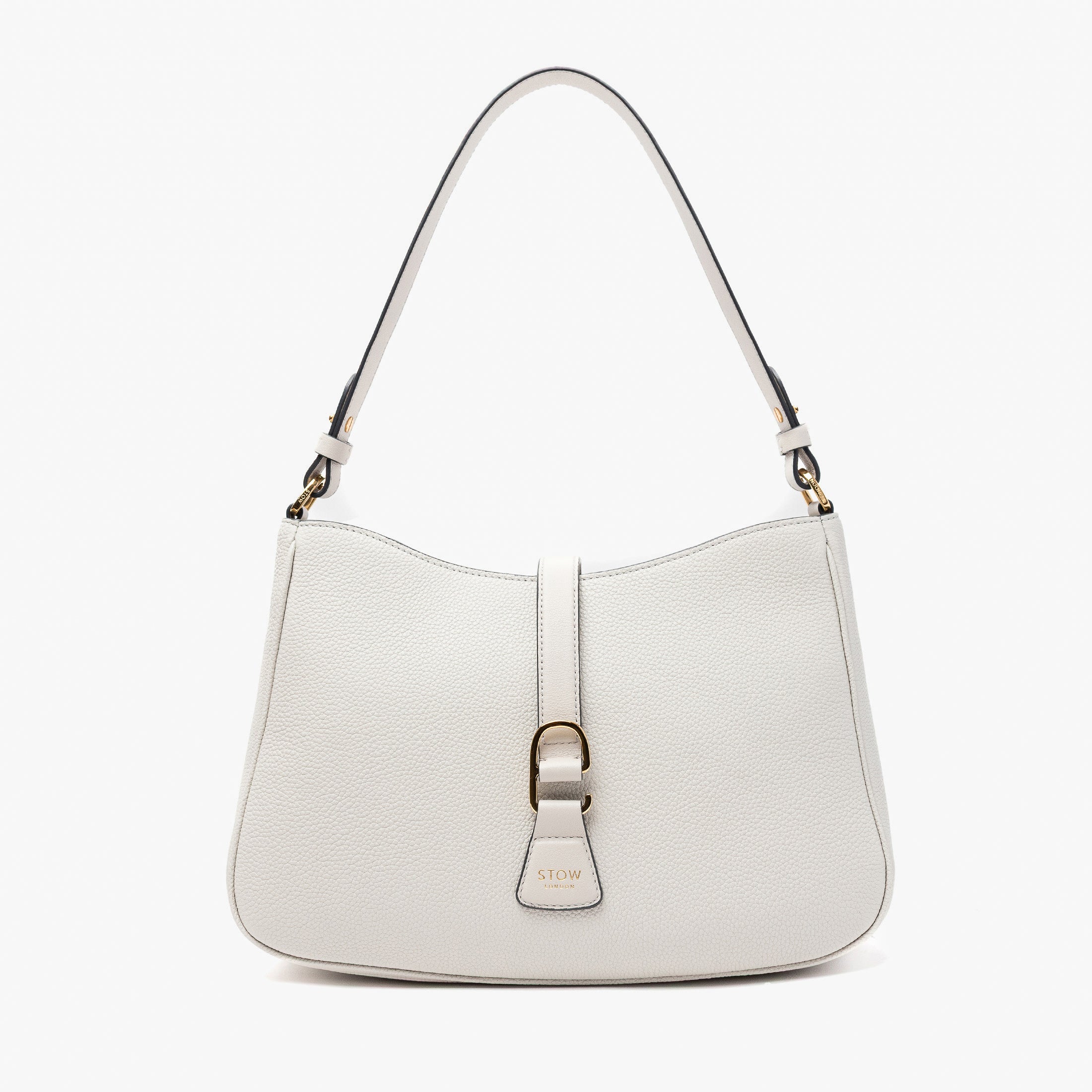 STOW London's Beth bag in Cloud Grey pebbled and smooth leather featuring gold-coated stainless steel hardware and clip on a white background