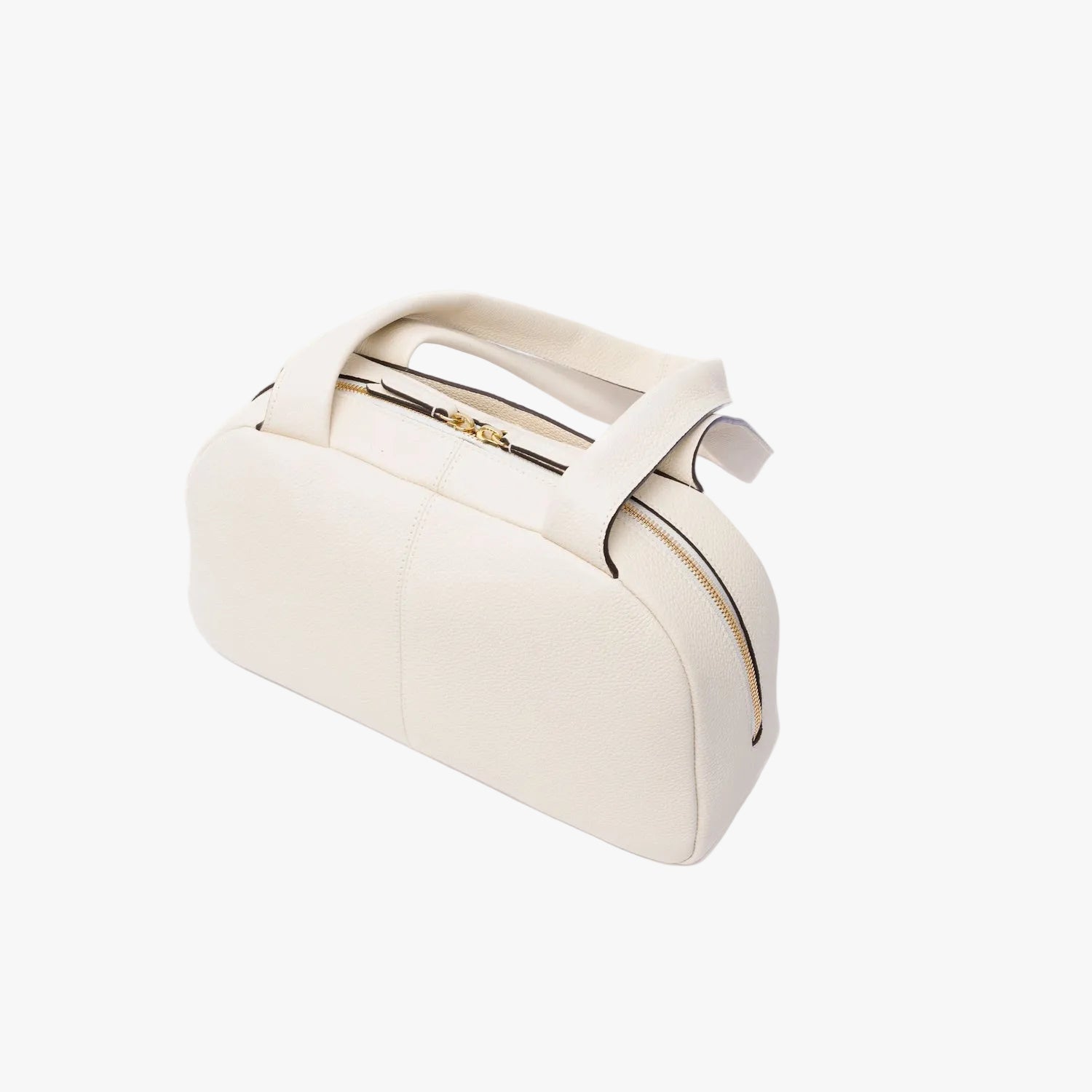 Back panel of STOW London's Bowling bag in Spring Moon pebbled leather featuring gold-coated stainless steel hardware on a light grey background