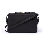 Black leather Camera Bag by STOW, studio image showing front of bag and crossbody strap.