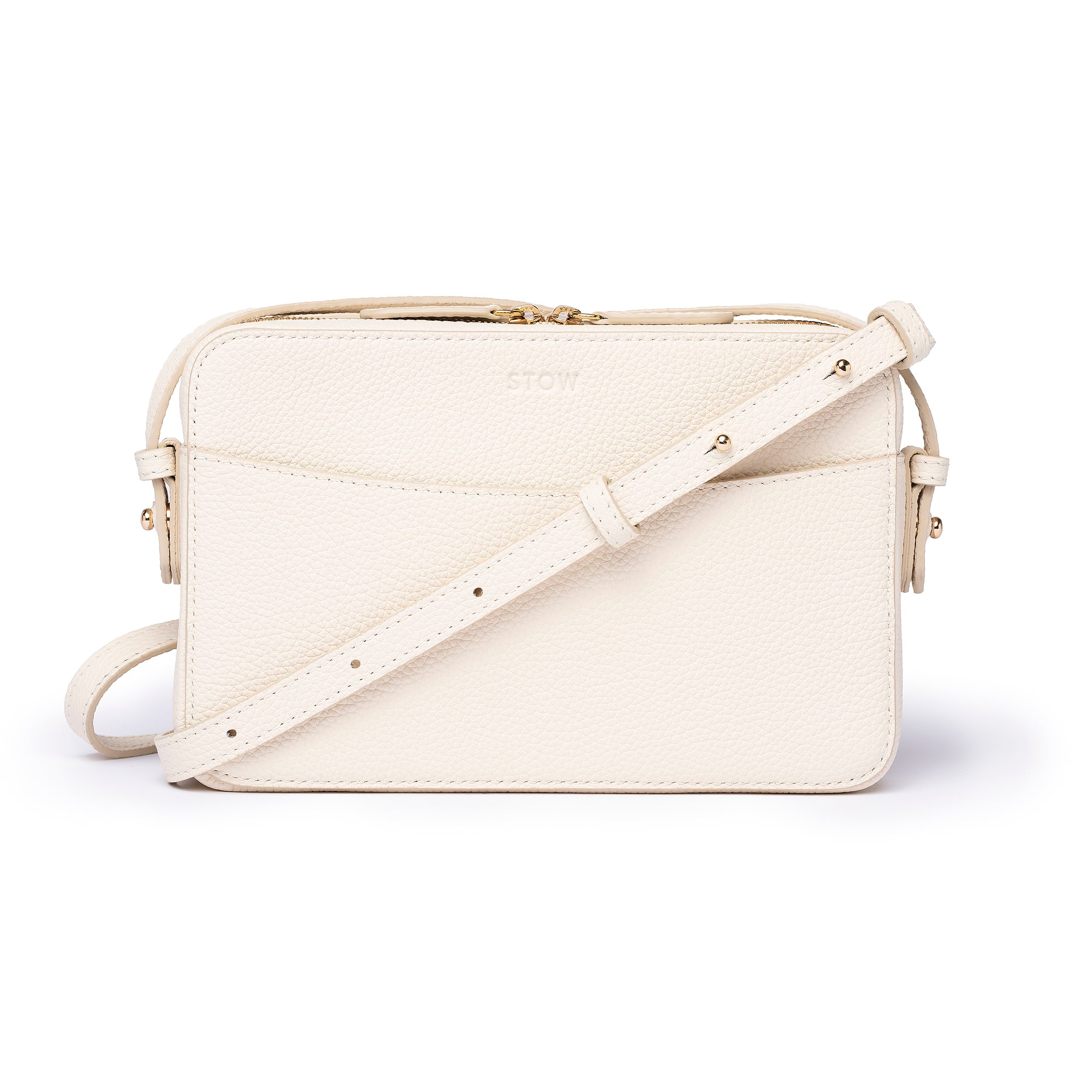 Spring Moon cream leather Camera Bag by STOW, studio image showing front of bag and crossbody strap.