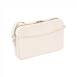 Spring Moon cream leather Camera Bag by STOW, studio image showing bag diagonally with crossbody strap.