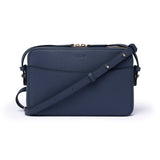 Navy leather Camera Bag by STOW, studio image showing front of bag and crossbody strap.
