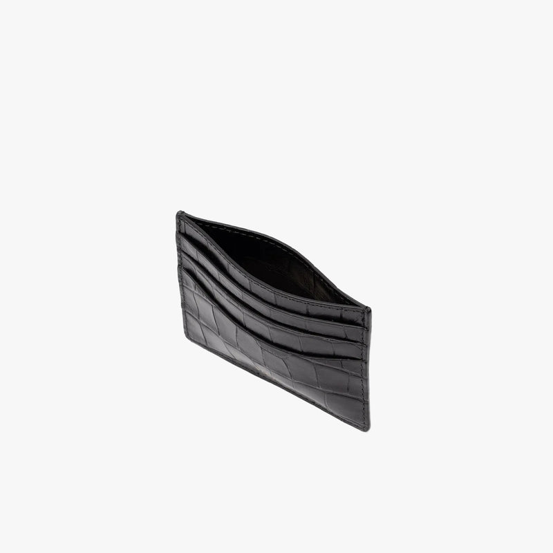 Top view of STOW London's Cardholder in Black Embossed Croc leather on a light grey background 