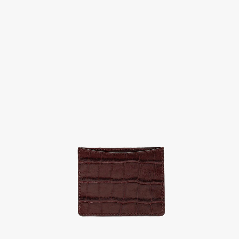 Back panel of STOW London's Cardholder in Burgundy Embossed Croc leather on a light grey background 