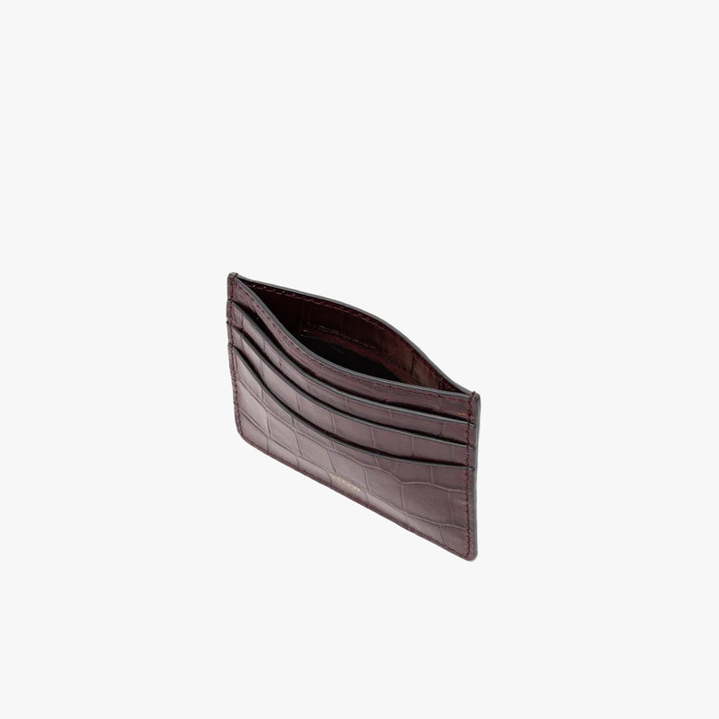 Top view of STOW London's Cardholder in Burgundy Embossed Croc leather on a light grey background