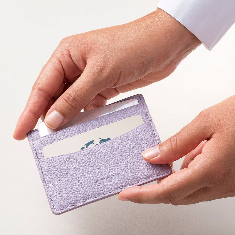 STOW Leather Cardholder in Wild Lavender colour being held by model.