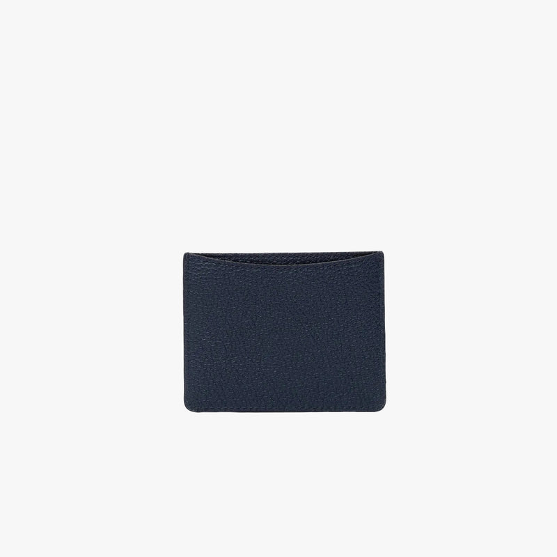 Back panel of STOW London's Cardholder in Navy pebbled leather on a light grey background featuring the rear slip pocket 